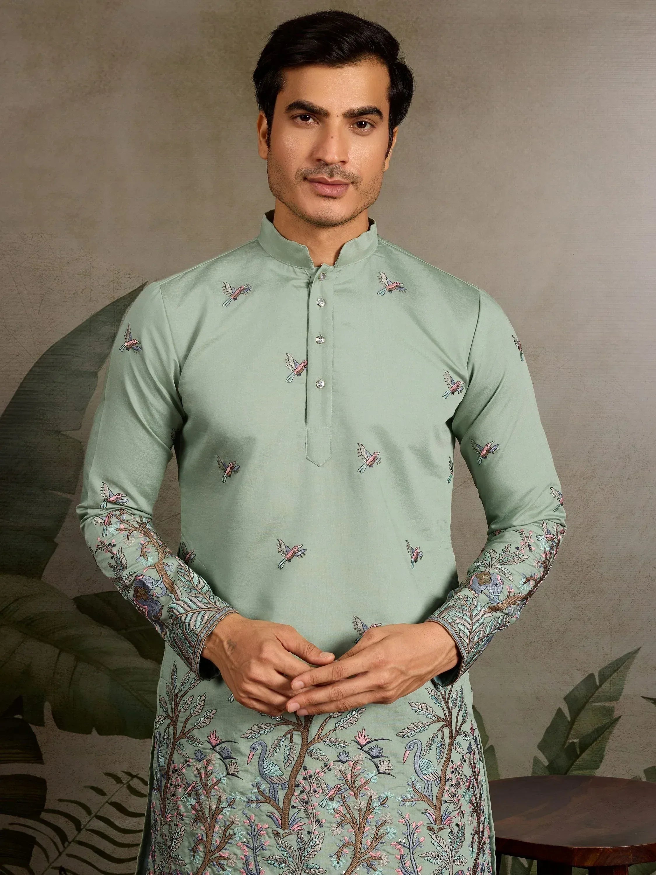 Mint green embroidered kurta with bird and tree motifs, ideal for Indian ethnic wear occasions