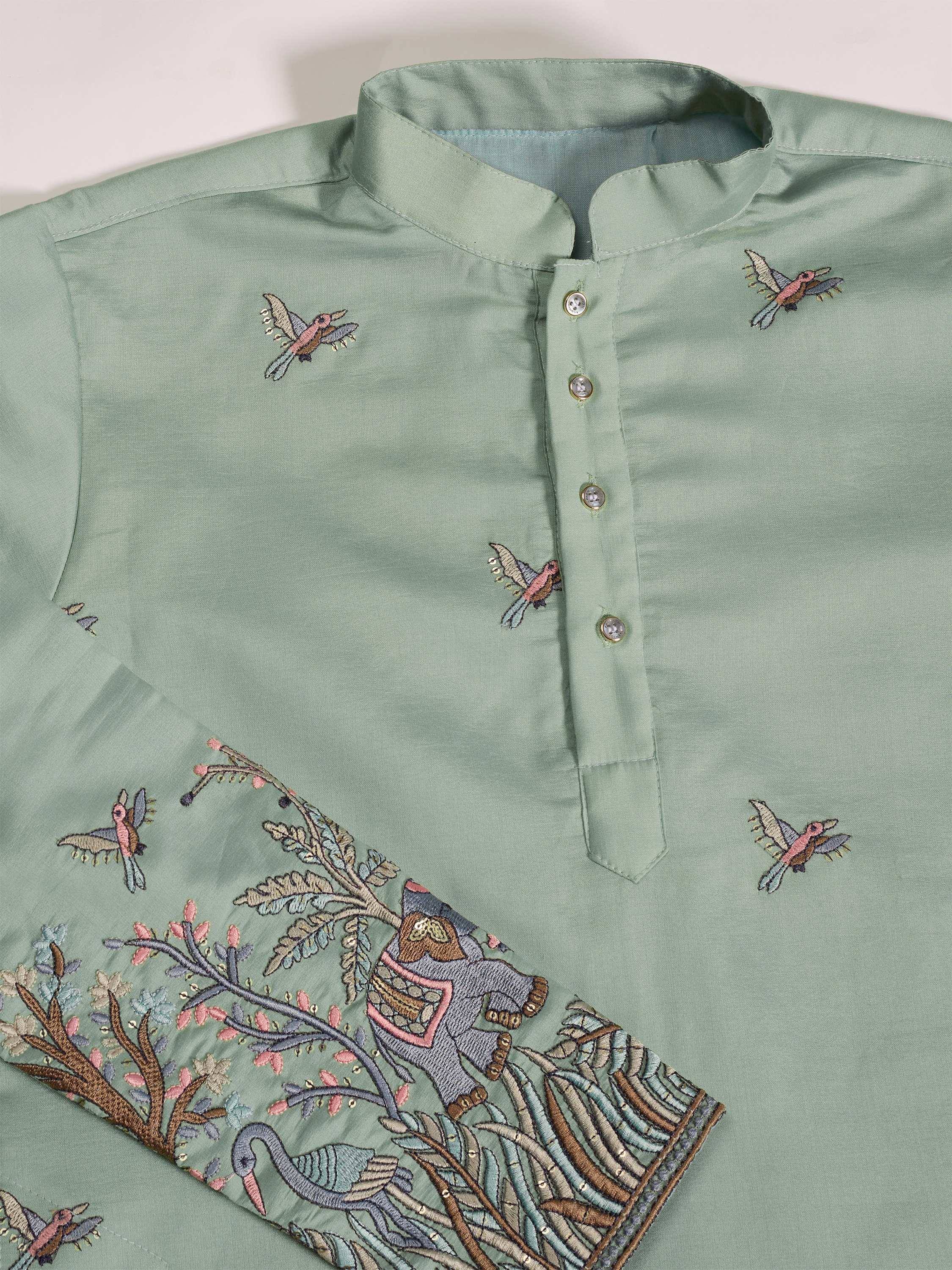 Mint green ethnic kurta with bird and elephant embroidery, perfect for Indian wear