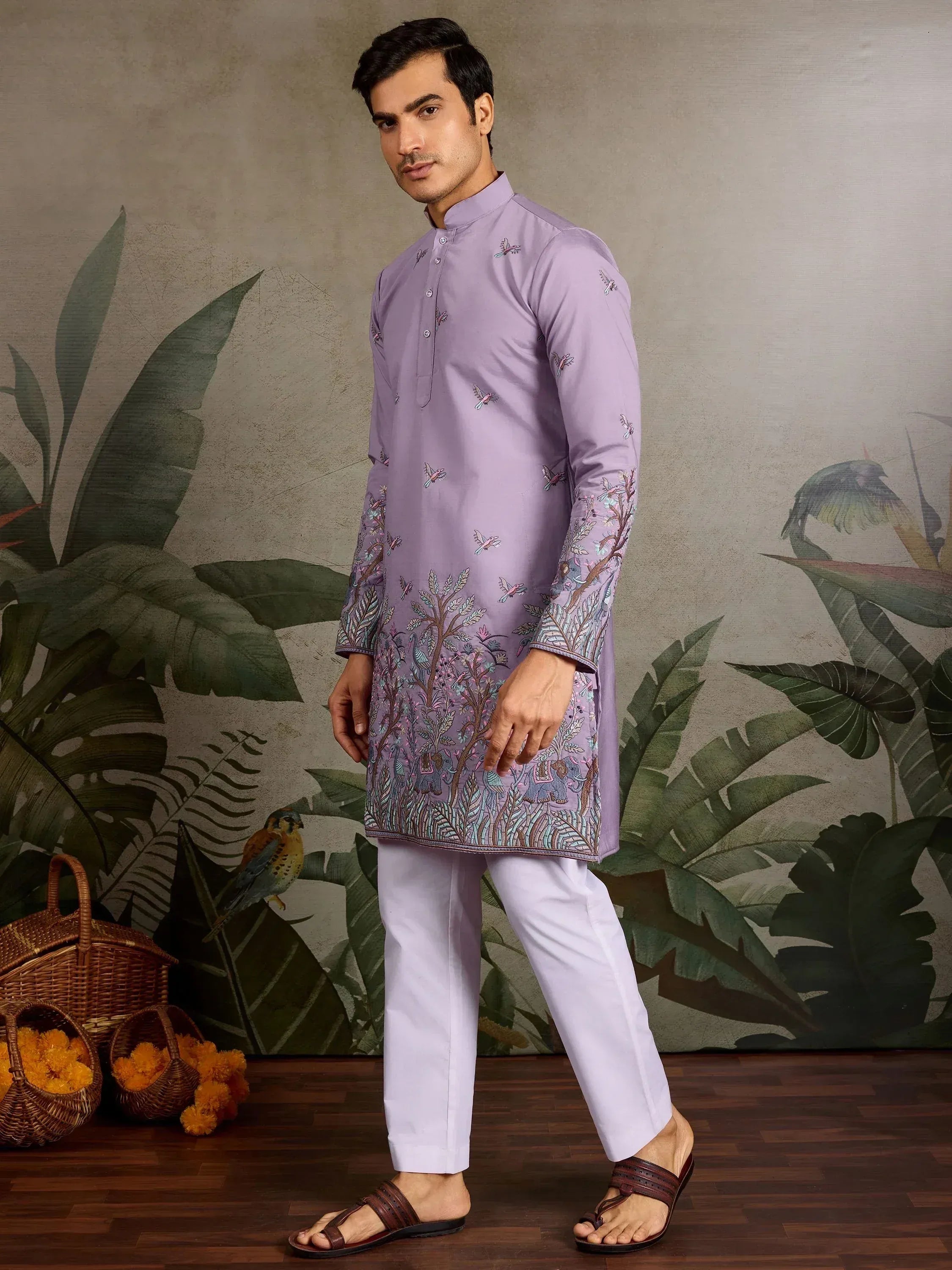 Lavender embroidered kurta with white pants, featuring bird and tree motifs, ideal for ethnic occasions.