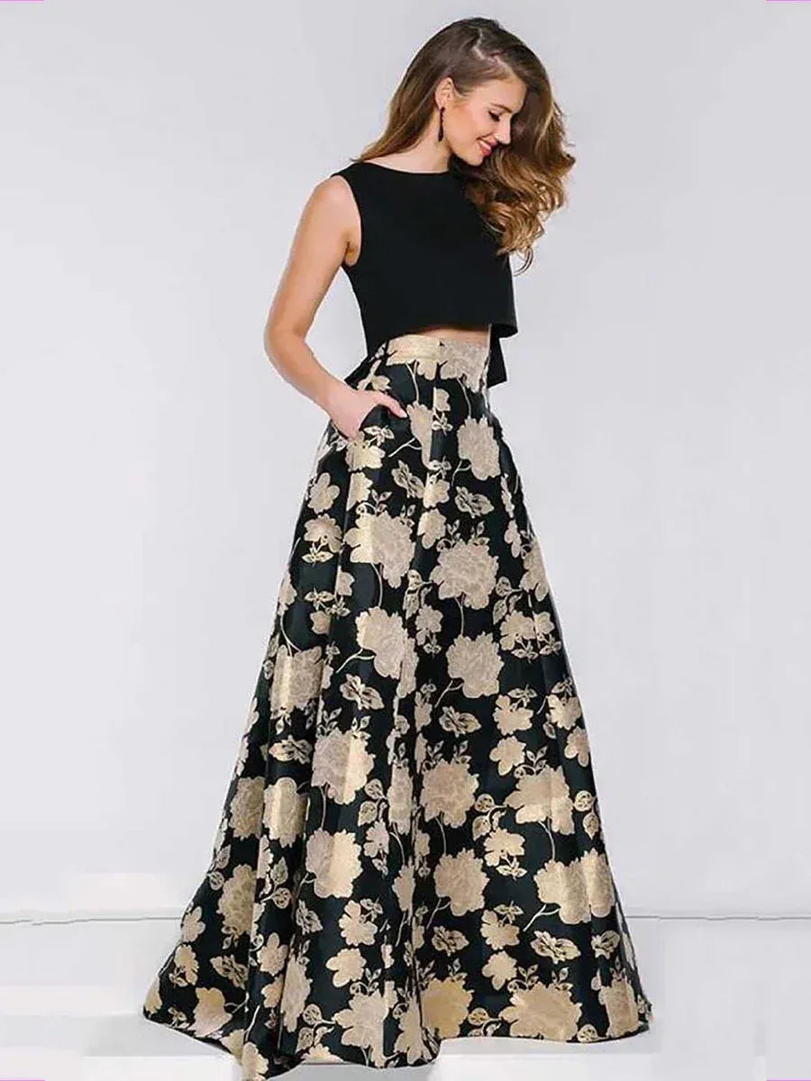 Black and gold floral print ethnic gown with sleeveless crop top, perfect for Indian occasions