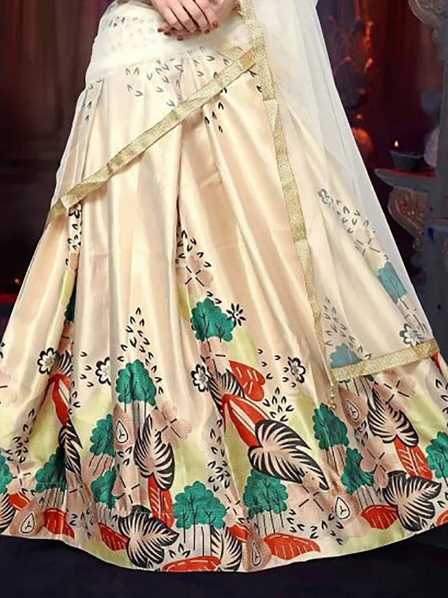 Cream lehenga with colorful floral print and gold trim, perfect for Indian ethnic wear