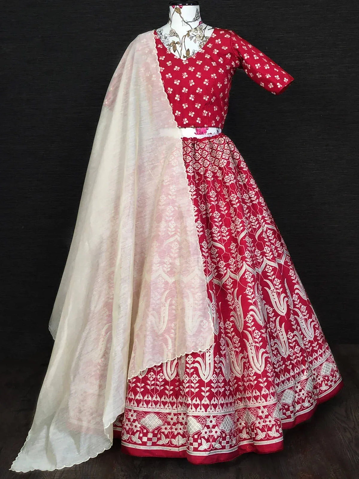 Teal embroidered saree with red printed lehenga, perfect for Indian ethnic wear occasions