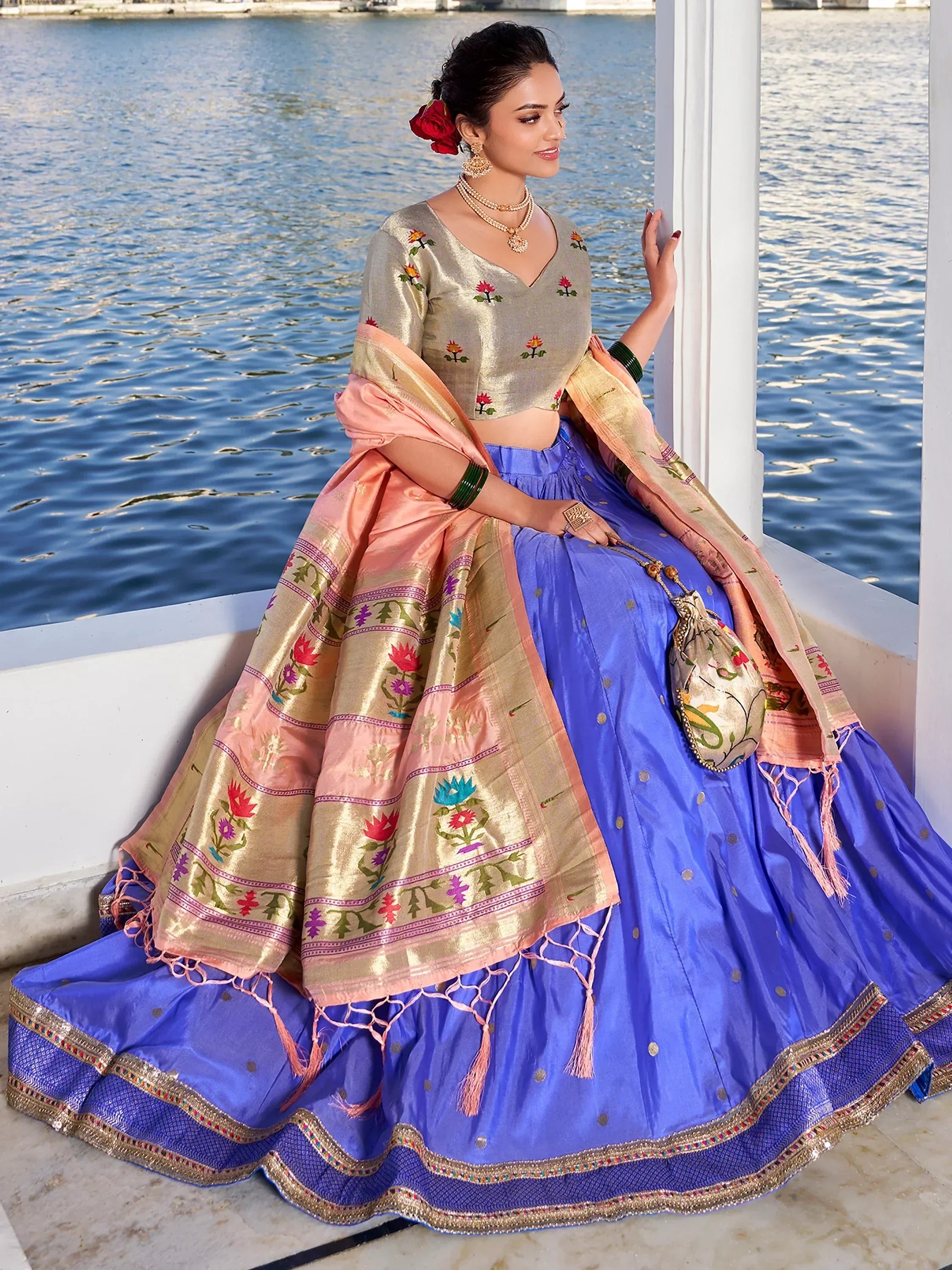 Blue lehenga choli with floral embroidered dupatta, perfect for Indian ethnic wear and festive occasions.