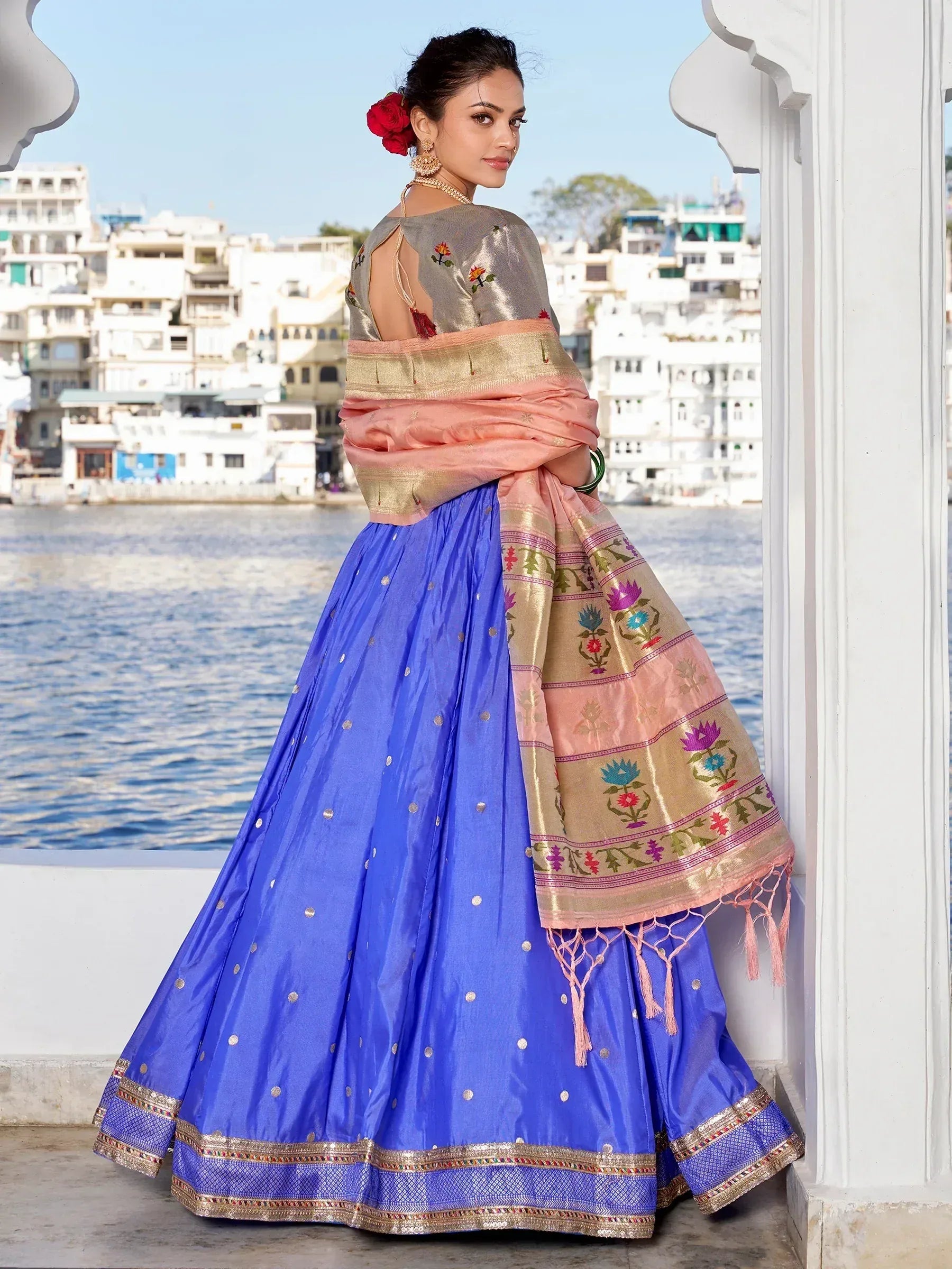 Blue lehenga choli with floral dupatta, perfect for Indian ethnic wear and festive occasions.