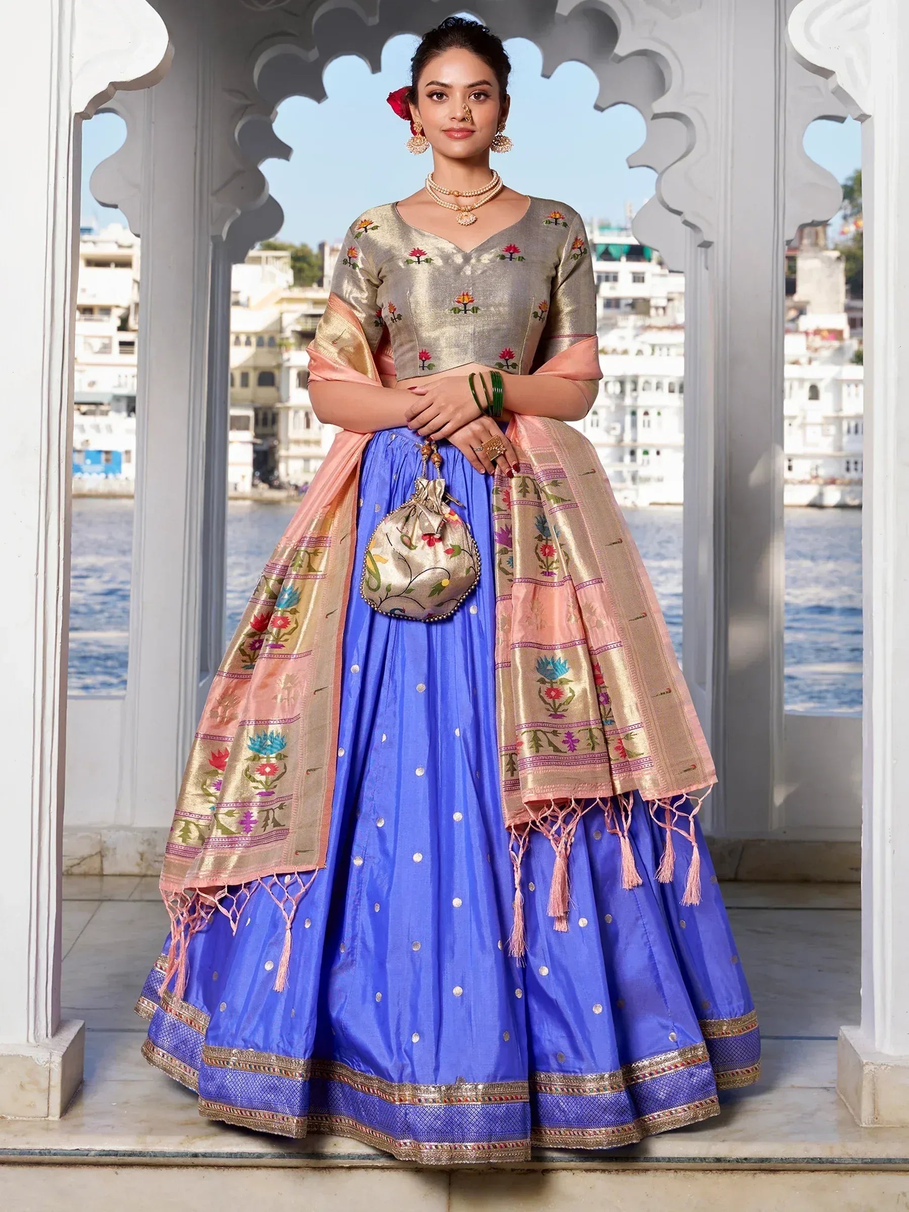 Blue embroidered lehenga choli with floral dupatta, perfect for Indian ethnic wear occasions