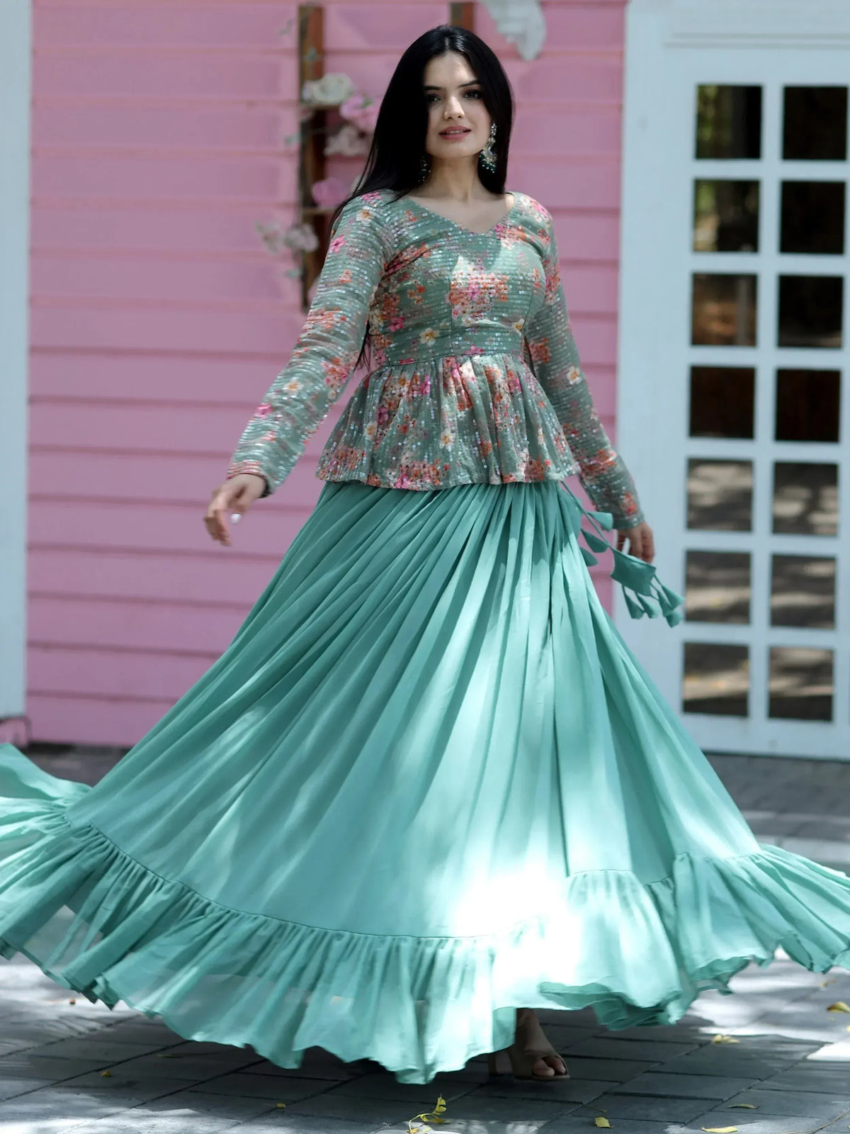 Mint green ethnic gown with floral sequin top and pleated skirt, perfect for Indian festive occasions