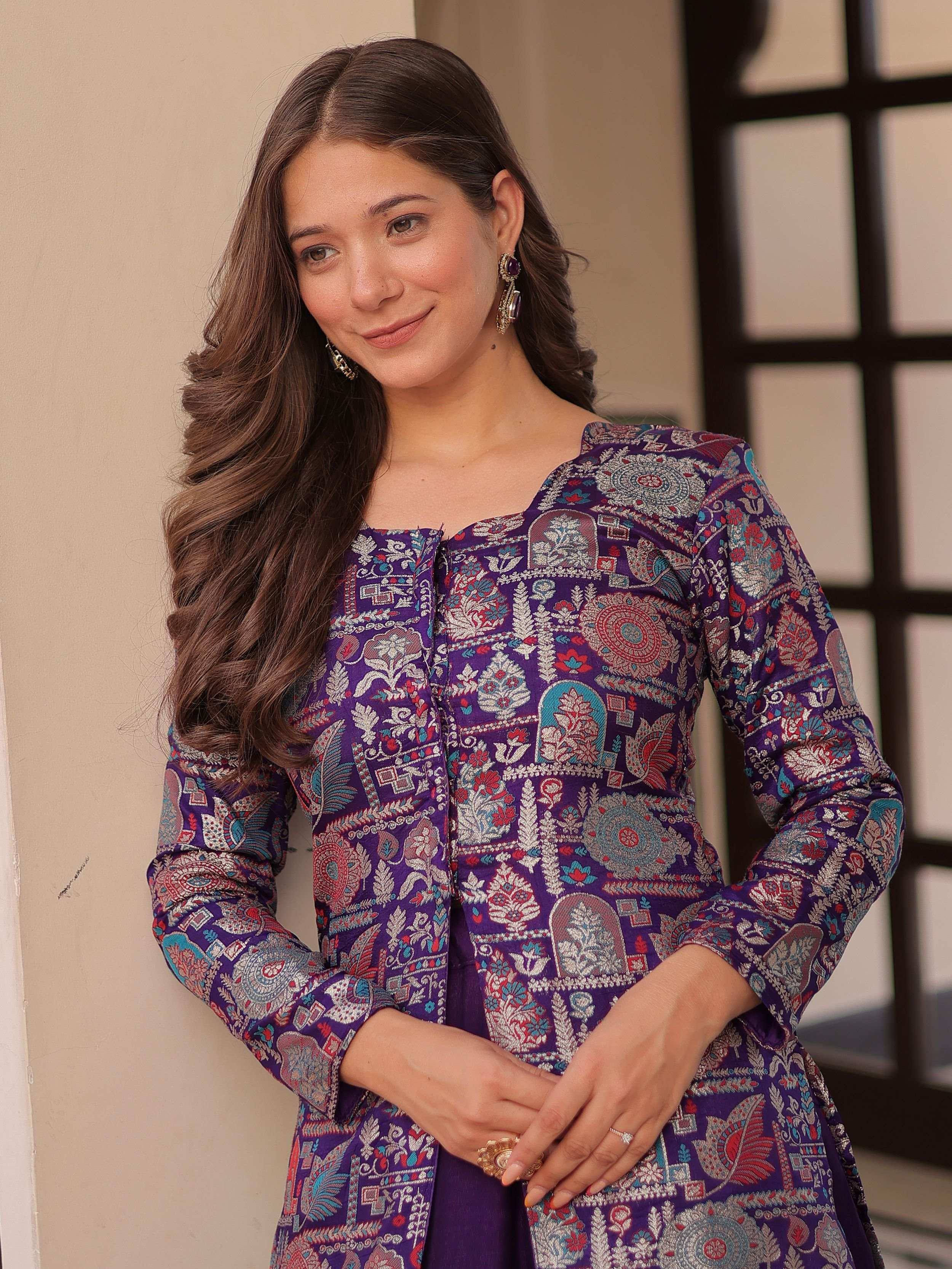 Woman in purple ethnic printed kurta with floral motifs, perfect for Indian festive occasions