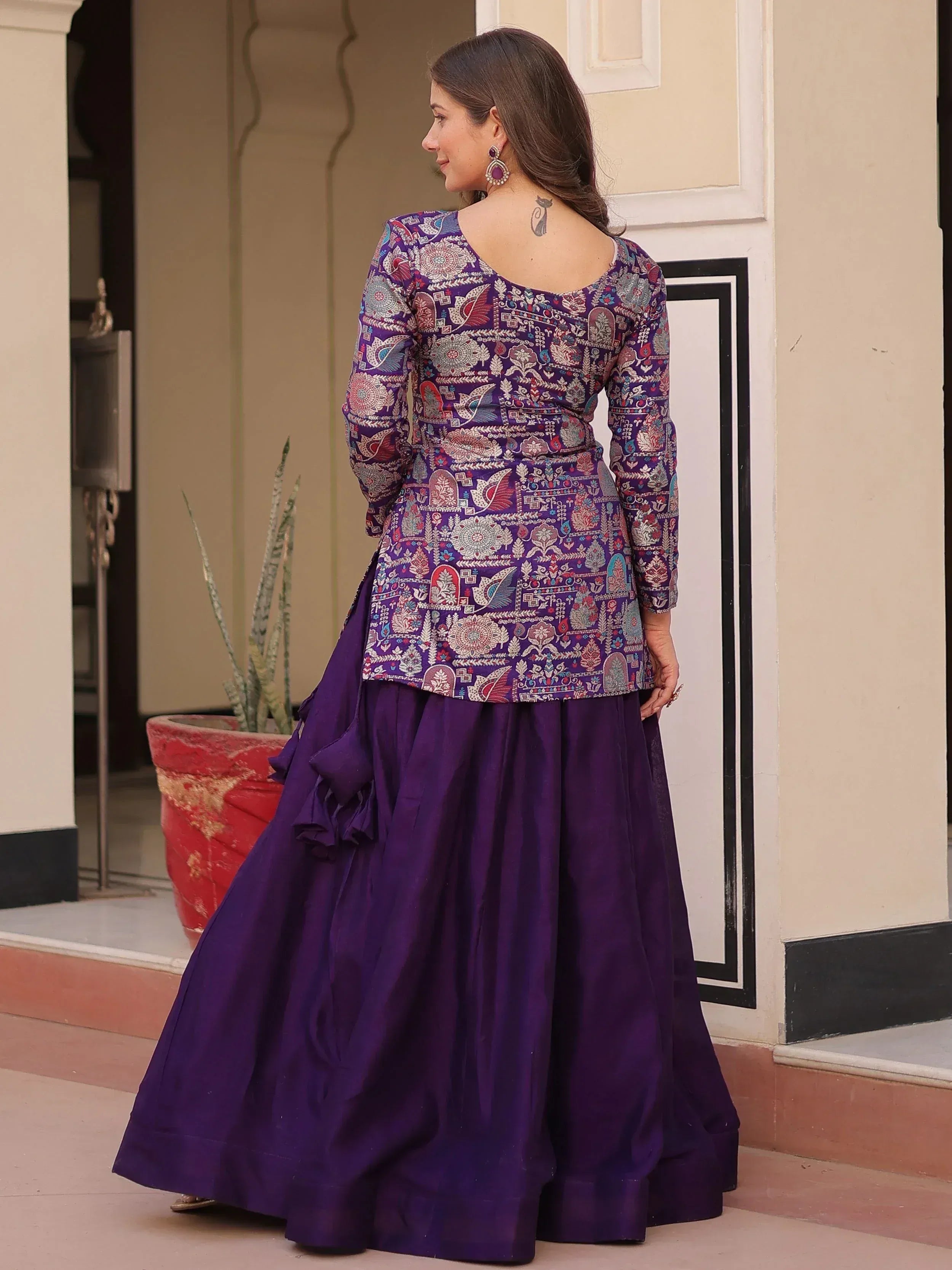 Purple printed ethnic lehenga choli with ruffled skirt, perfect for Indian weddings and festivals