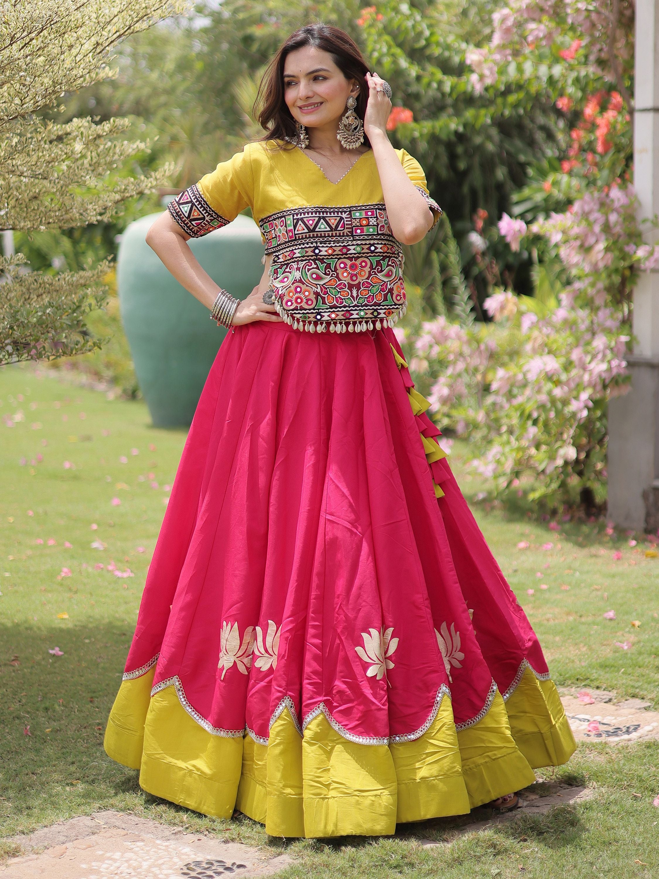 Captivating Pink Silk Navratri Wear Lehenga With Mirror Work Blouse