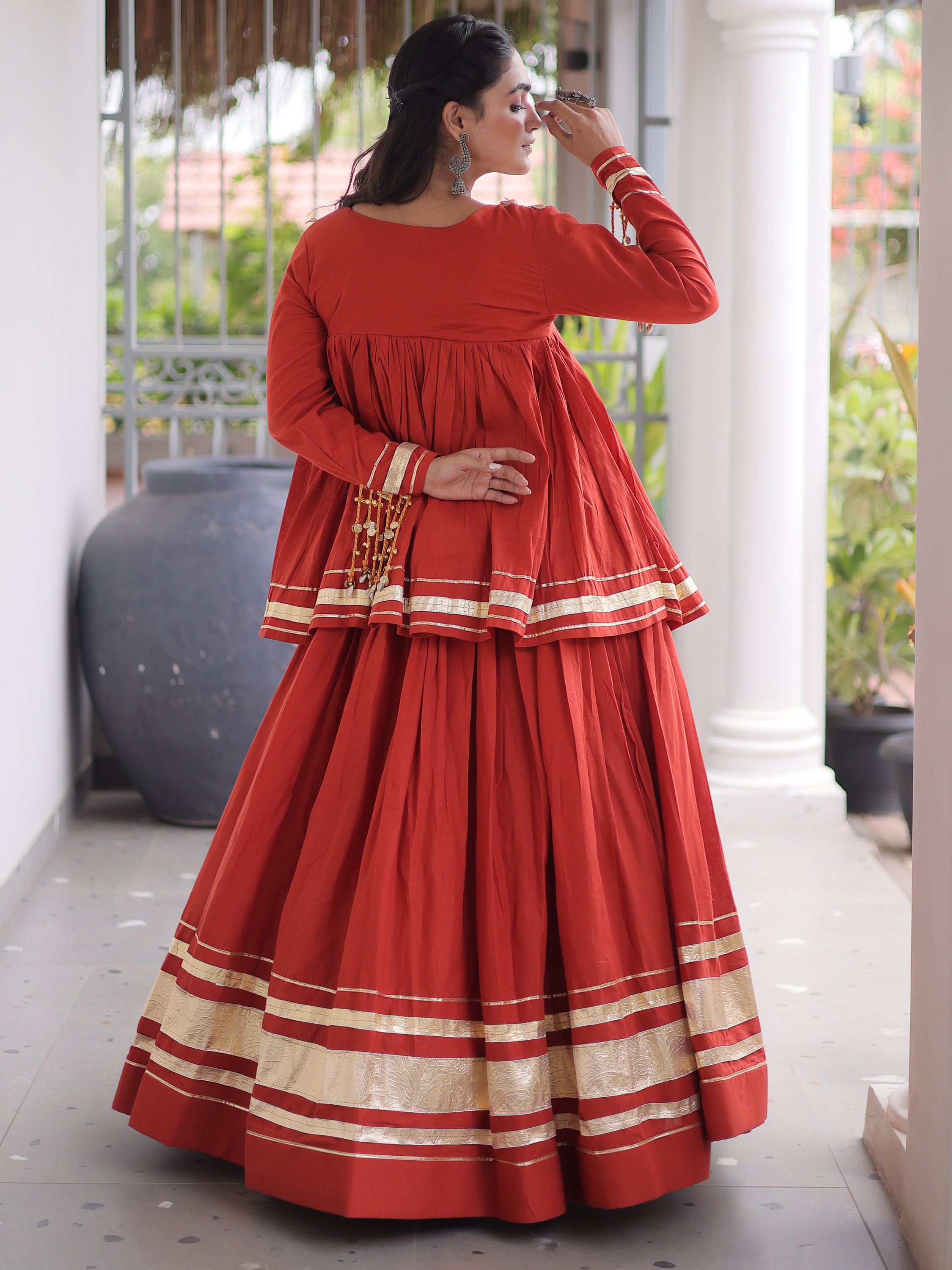 Rich Rust Orange Gota-Laced Festive Wear Lehenga With Peplum Top