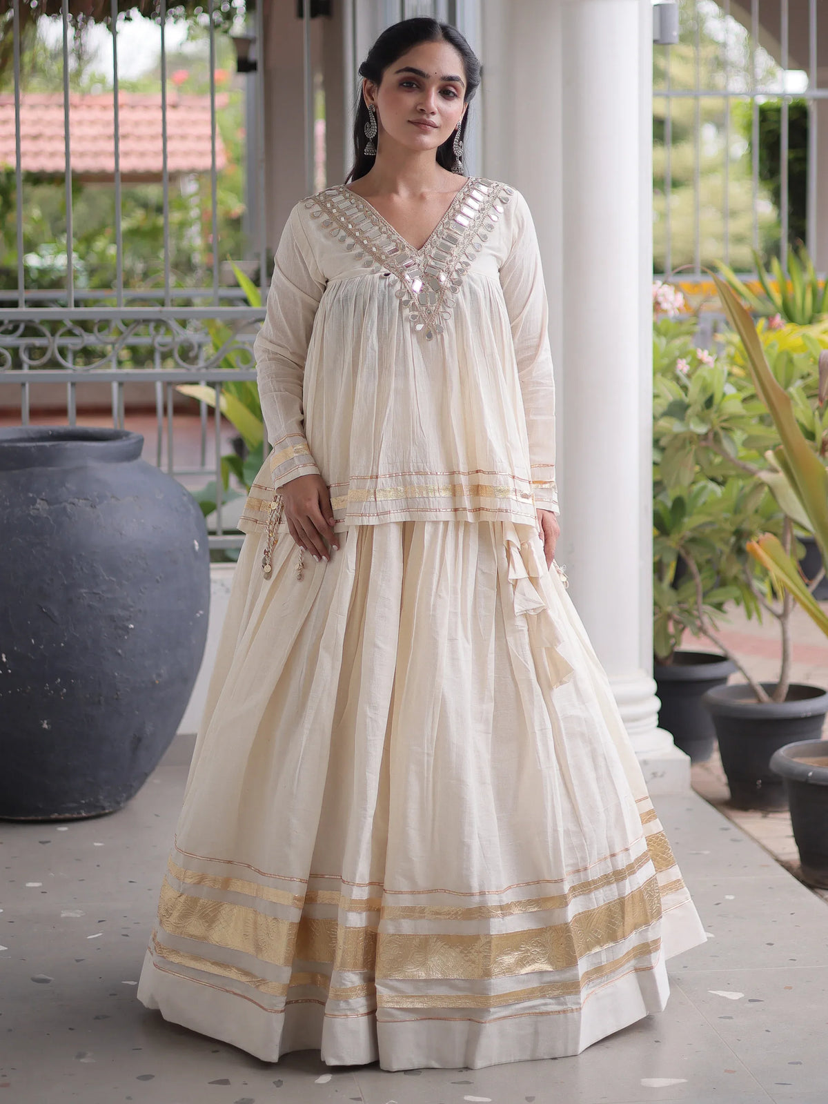 Alluring White Mirror Laced Navratri Wear Lehenga With Peplum Top