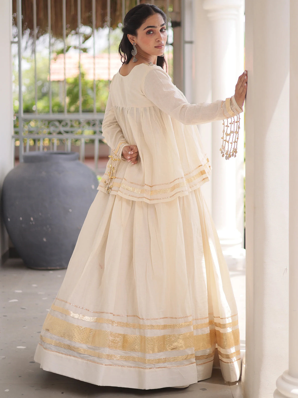 Alluring White Mirror Laced Navratri Wear Lehenga With Peplum Top