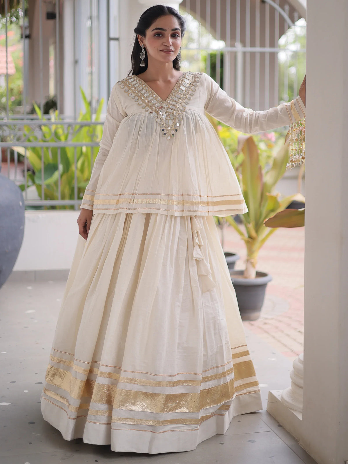 Alluring White Mirror Laced Navratri Wear Lehenga With Peplum Top