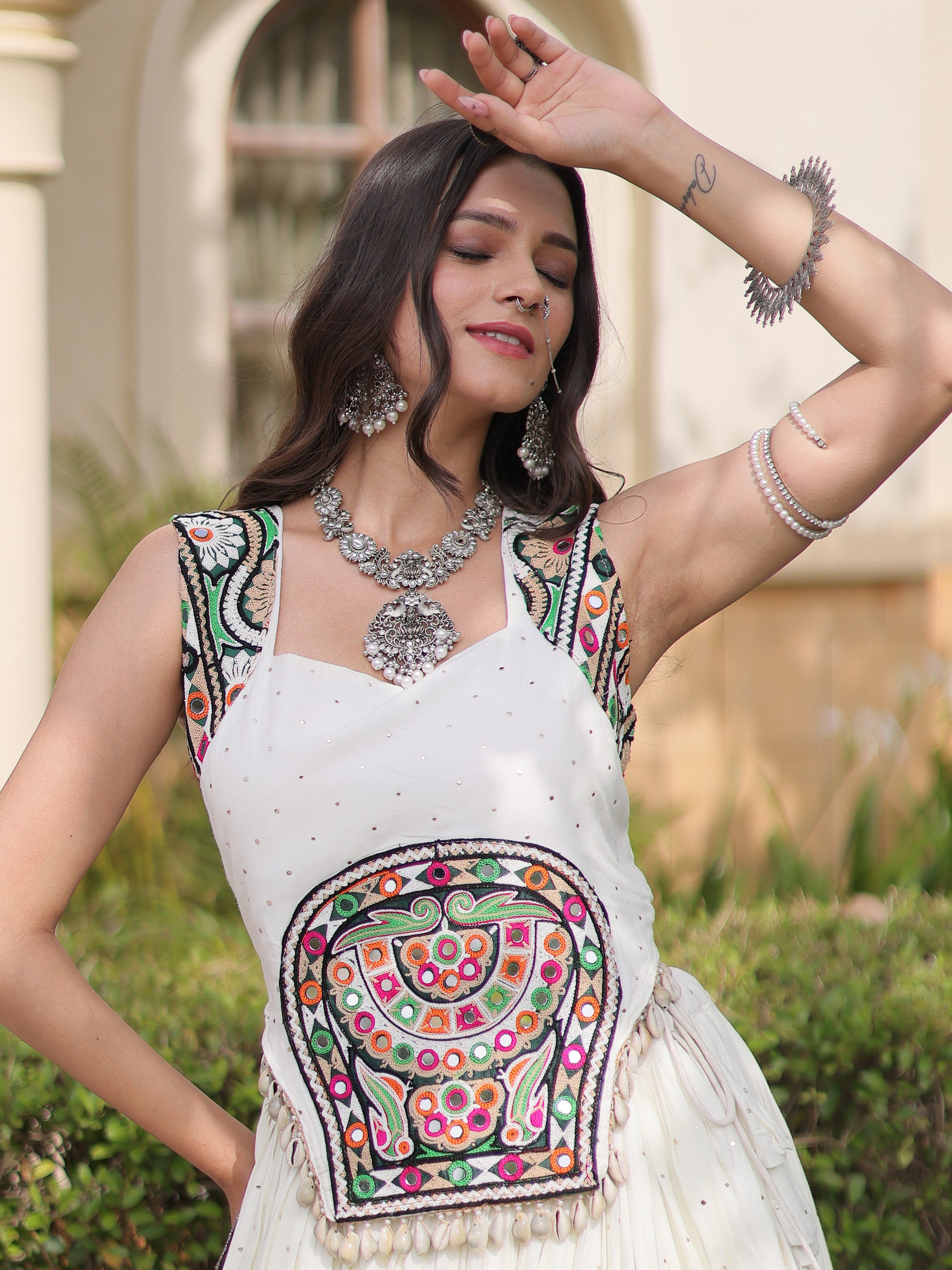 Attractive White Navratri Special Lehenga With Gamthi Work Choli