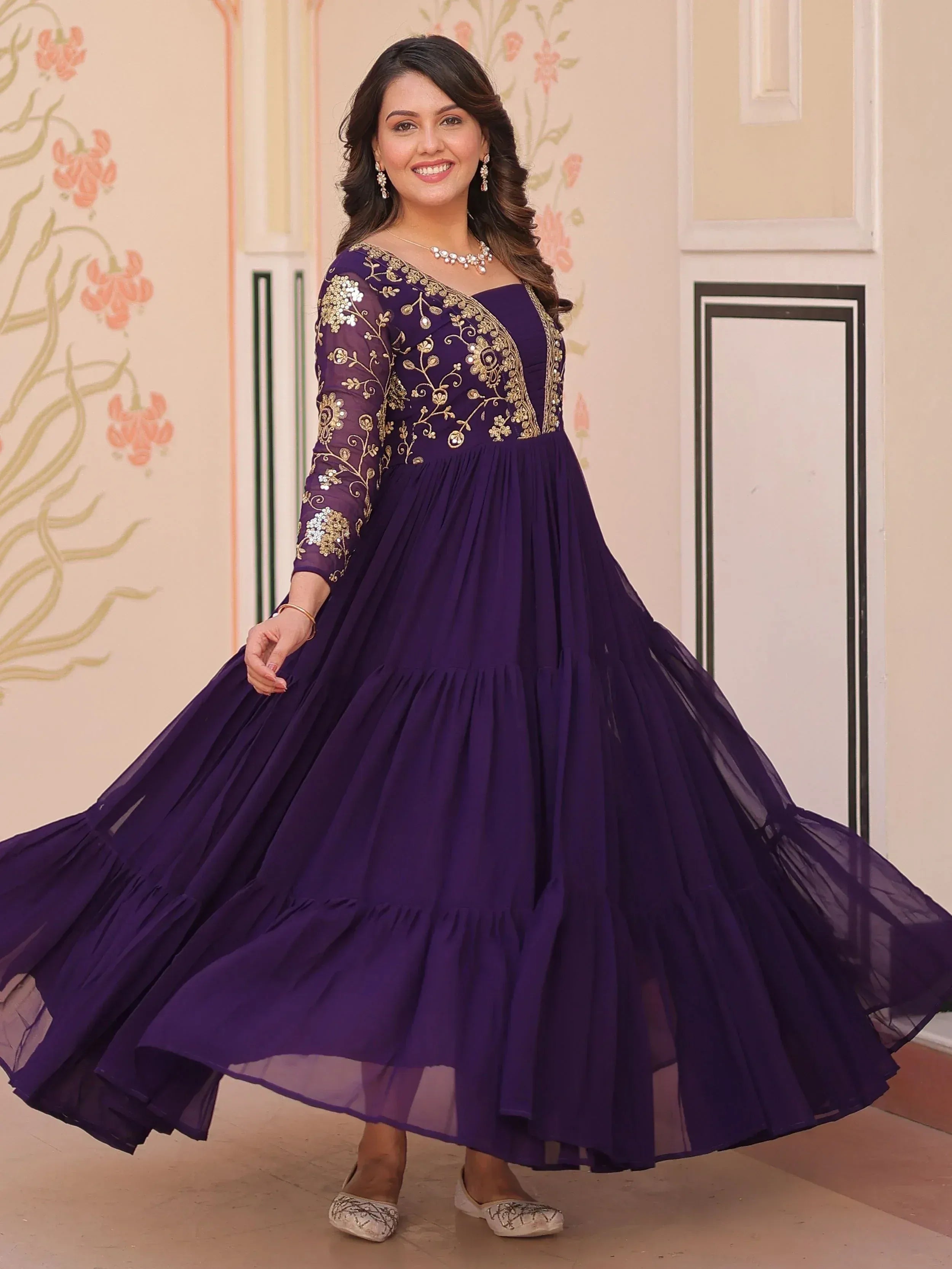 Purple ethnic gown with gold embroidery, perfect for Indian occasions and festive wear