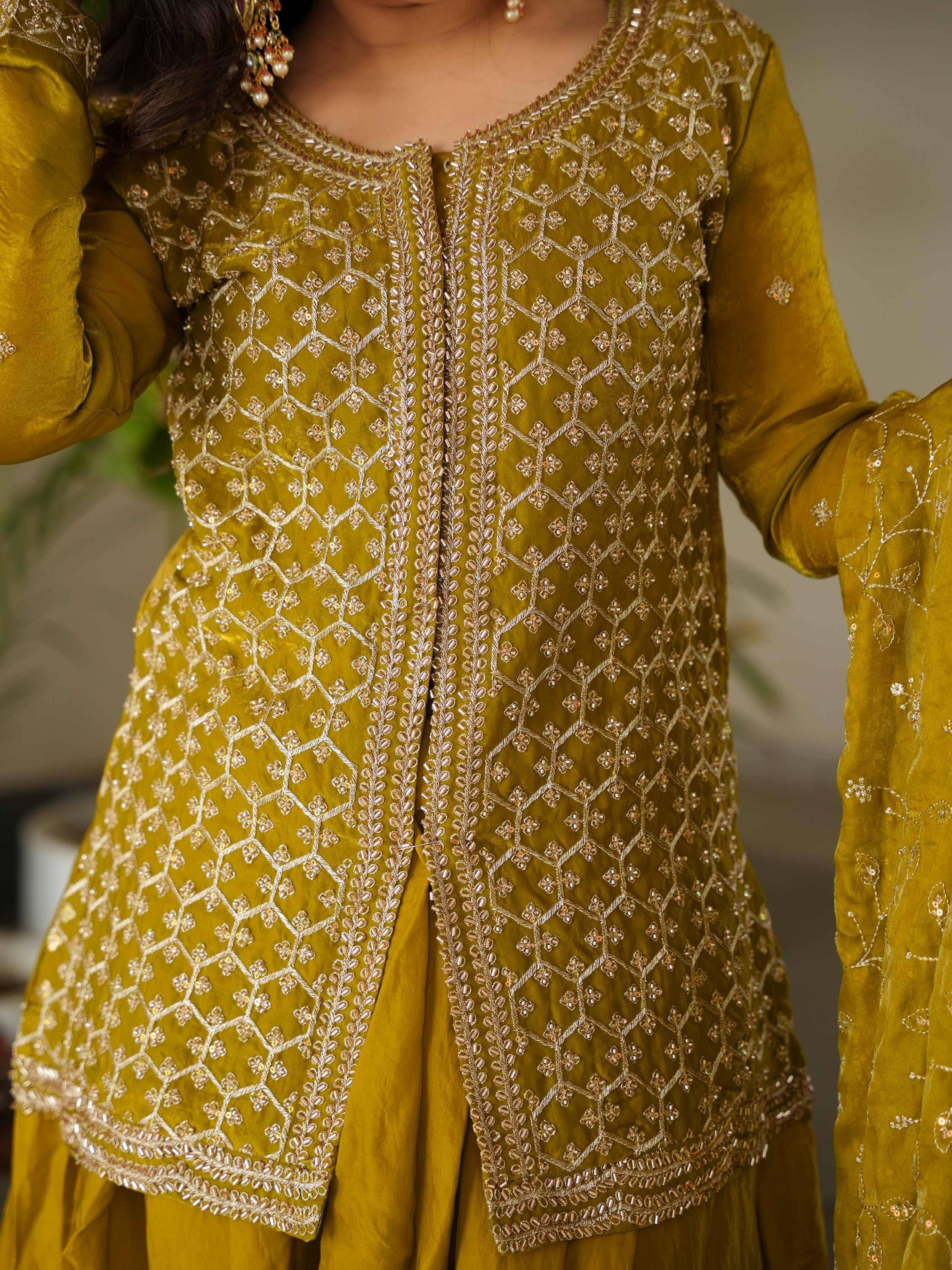 Mustard velvet ethnic suit with intricate gold embroidery and beadwork, perfect for Indian occasions