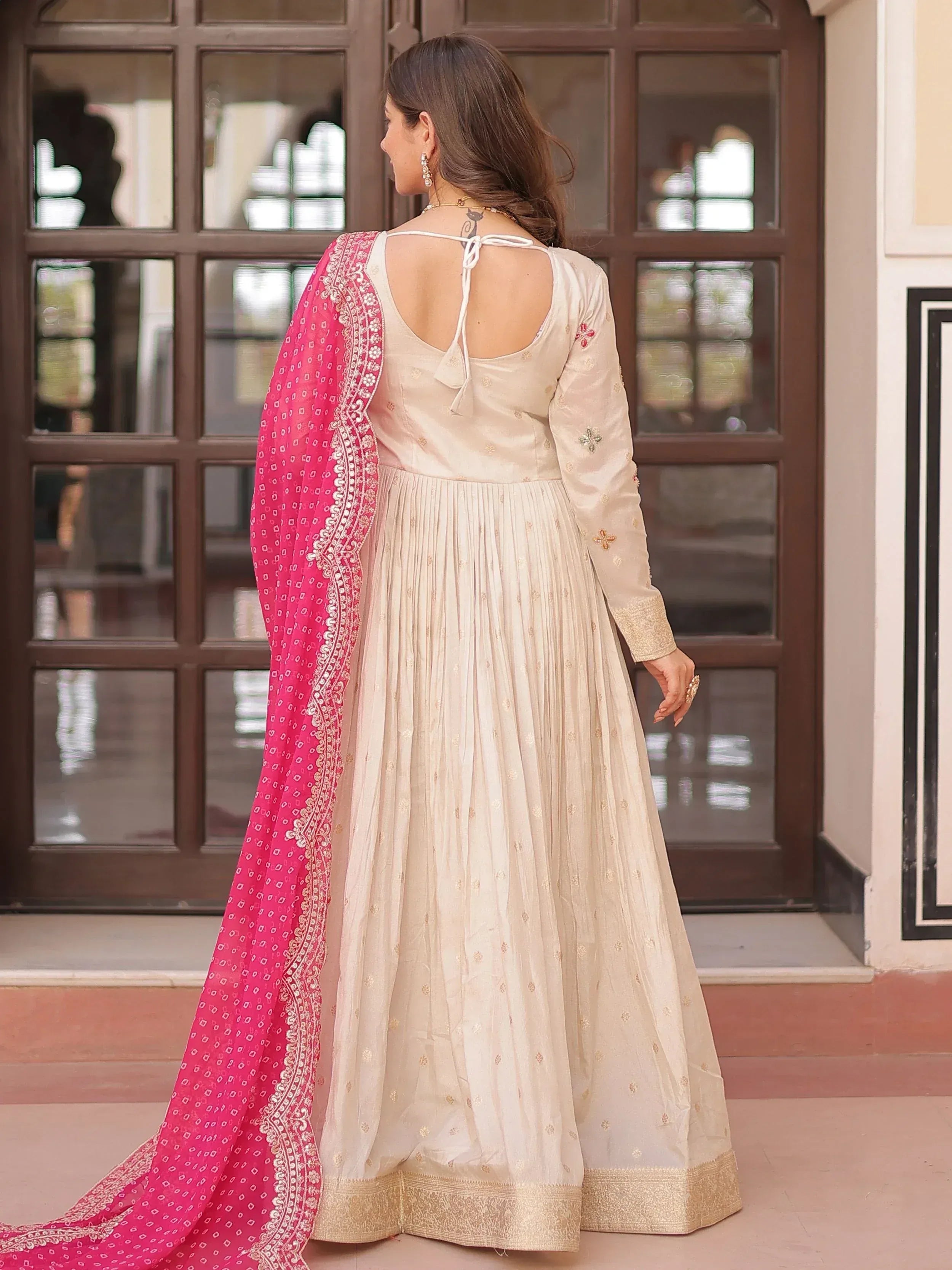Cream embroidered anarkali with pink dupatta, back view, Indian ethnic wear