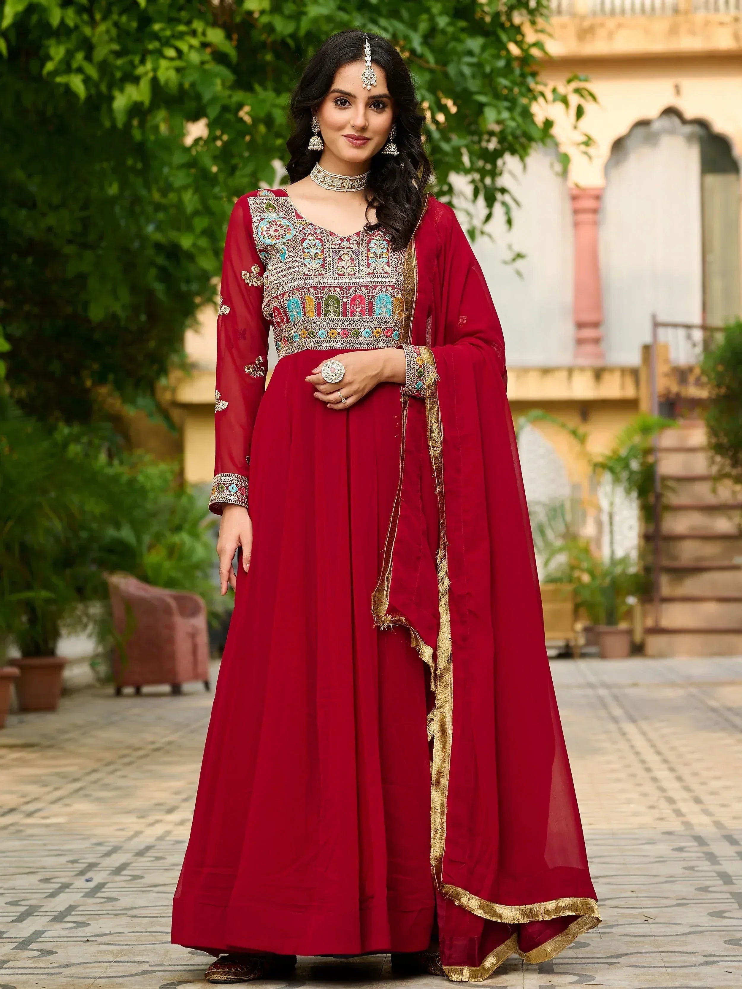 Maroon embroidered anarkali suit with gold trim, perfect for Indian ethnic occasions