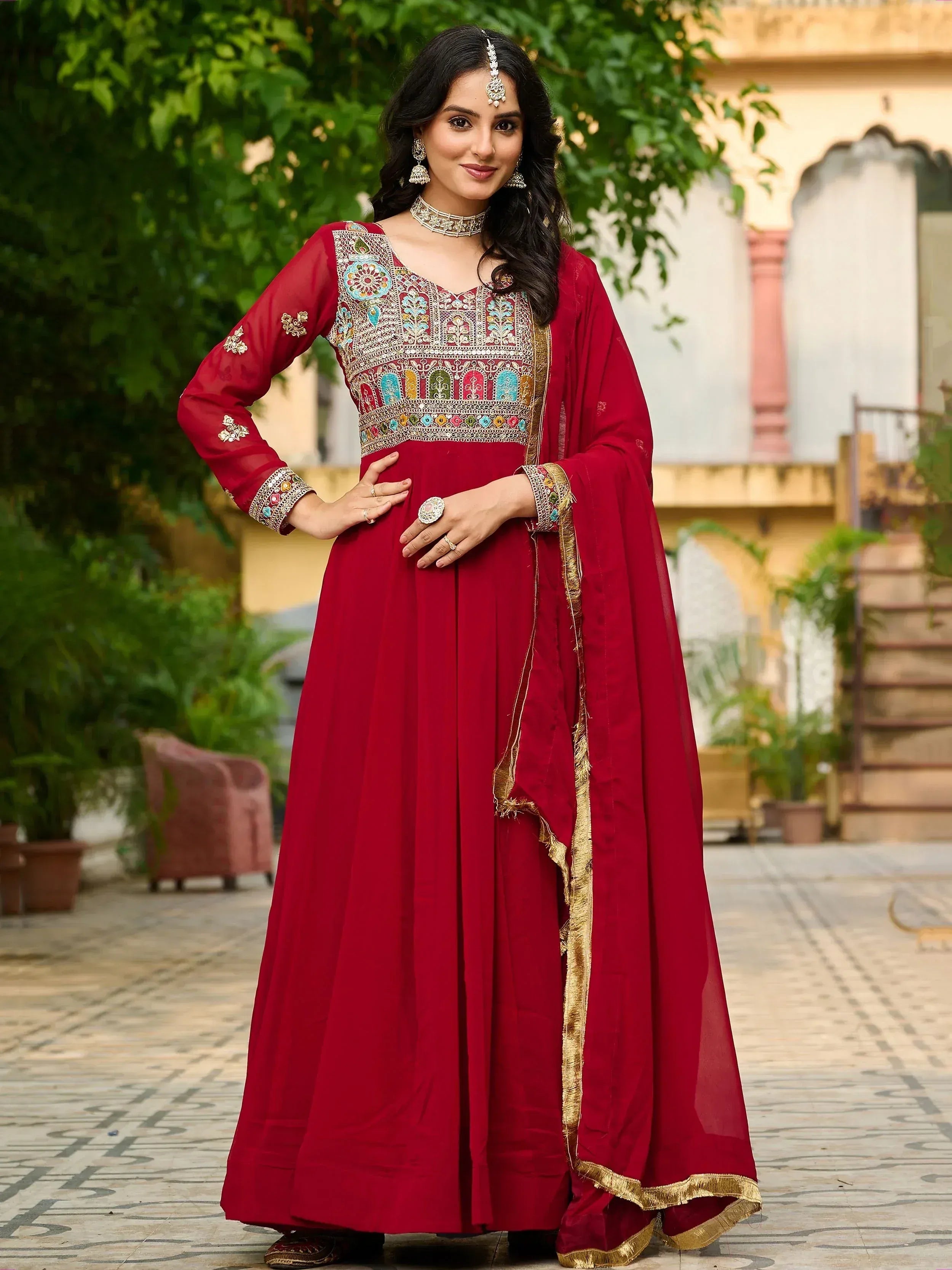 Maroon embroidered anarkali suit with gold trim, perfect for Indian ethnic wear occasions