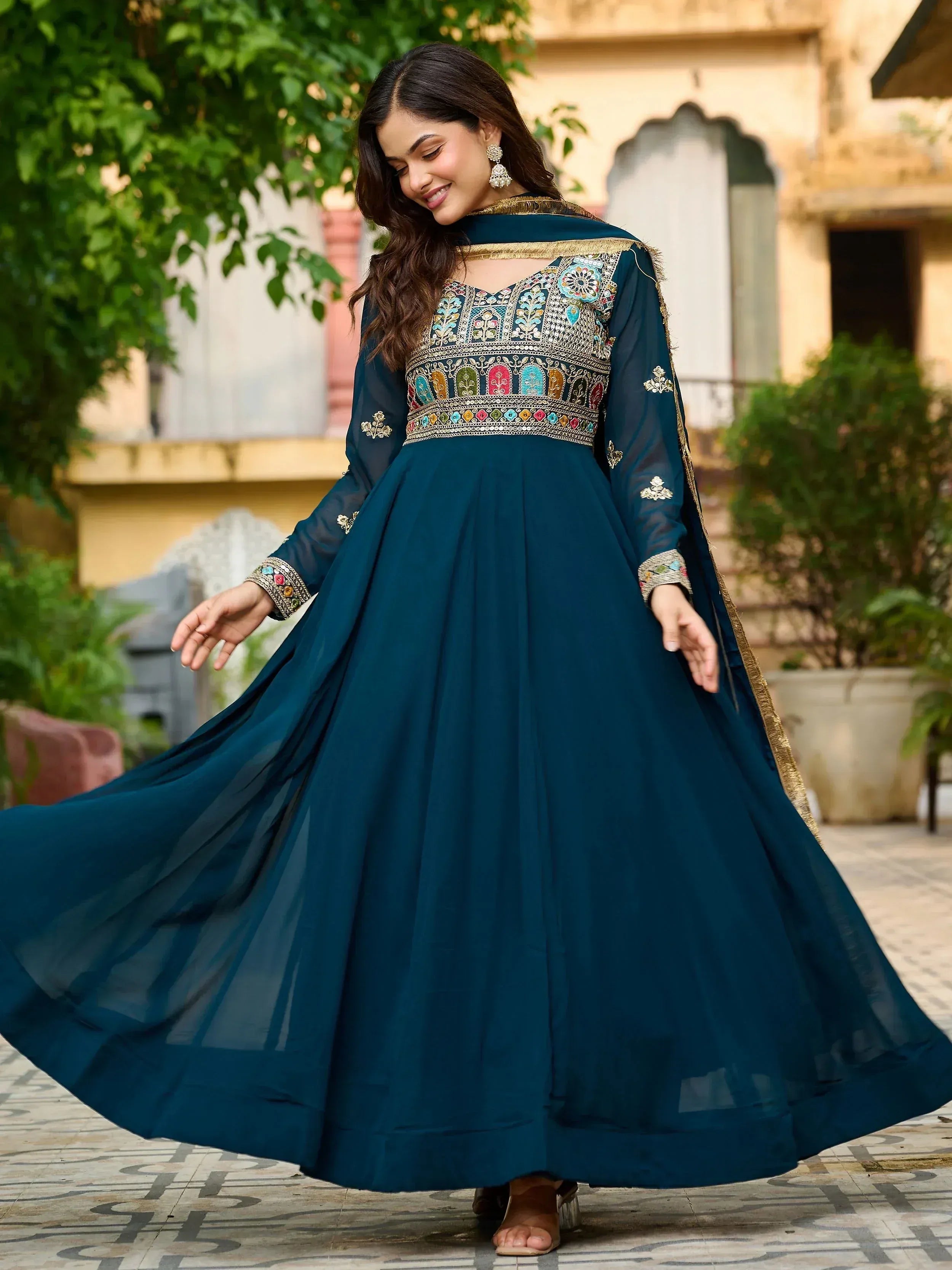 Teal embroidered anarkali suit with gold trim, perfect for Indian ethnic wear occasions