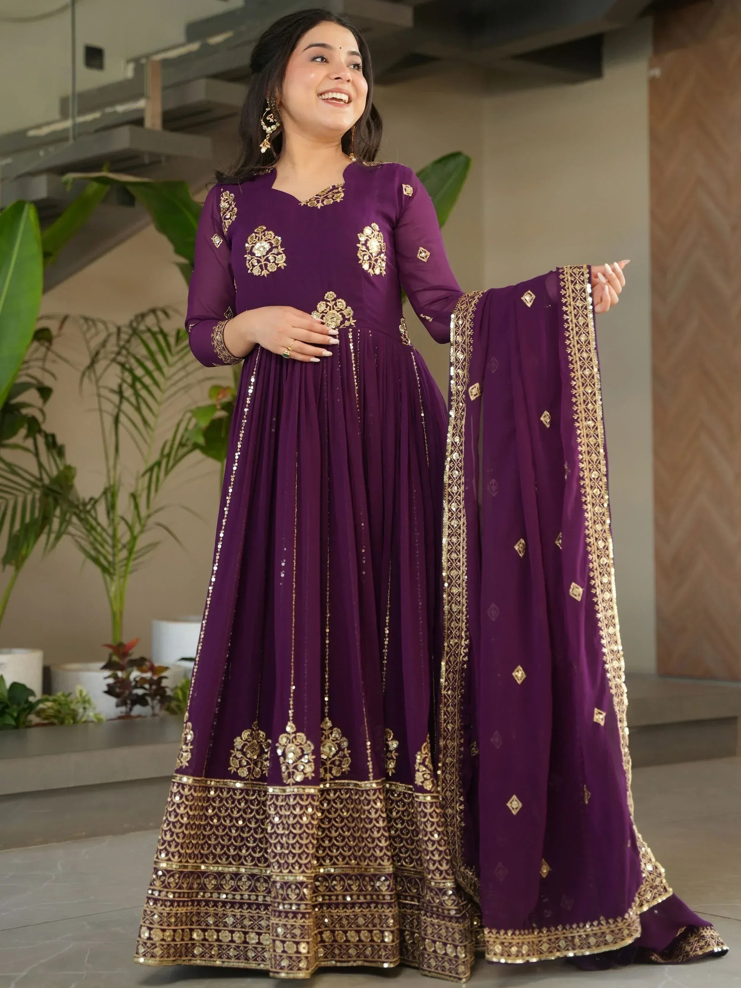 Purple embroidered anarkali with gold detailing, perfect for Indian ethnic wear and festive occasions.