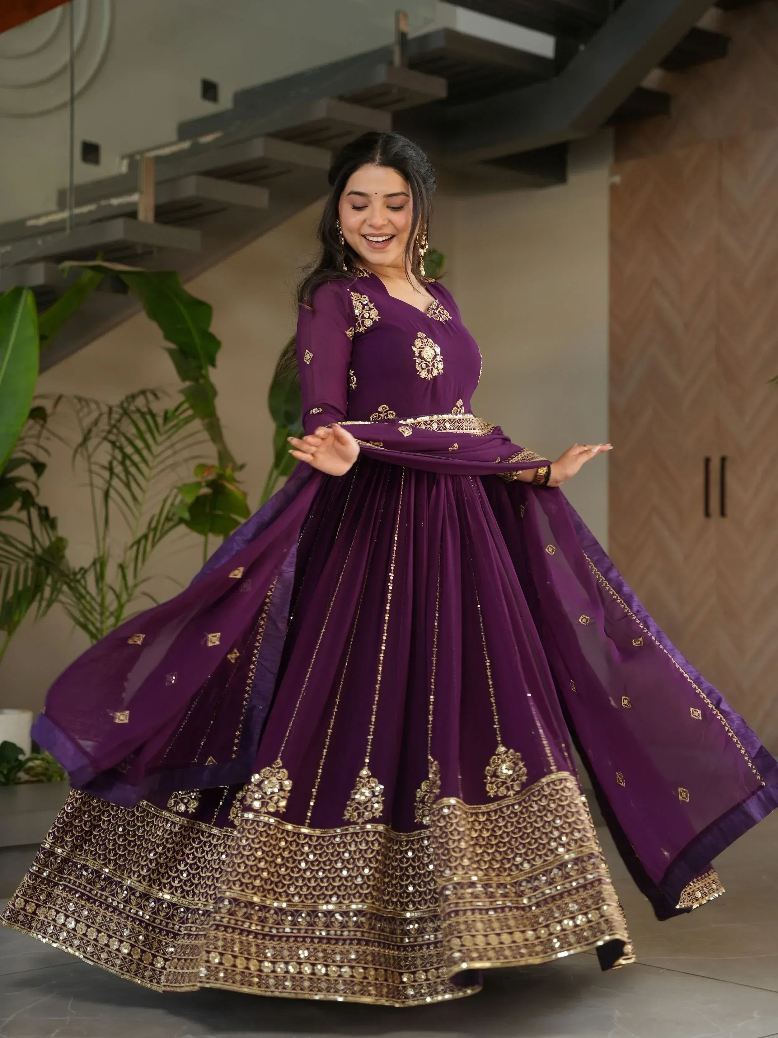 Elegant purple lehenga choli with gold embroidery, perfect for Indian ethnic wear occasions.