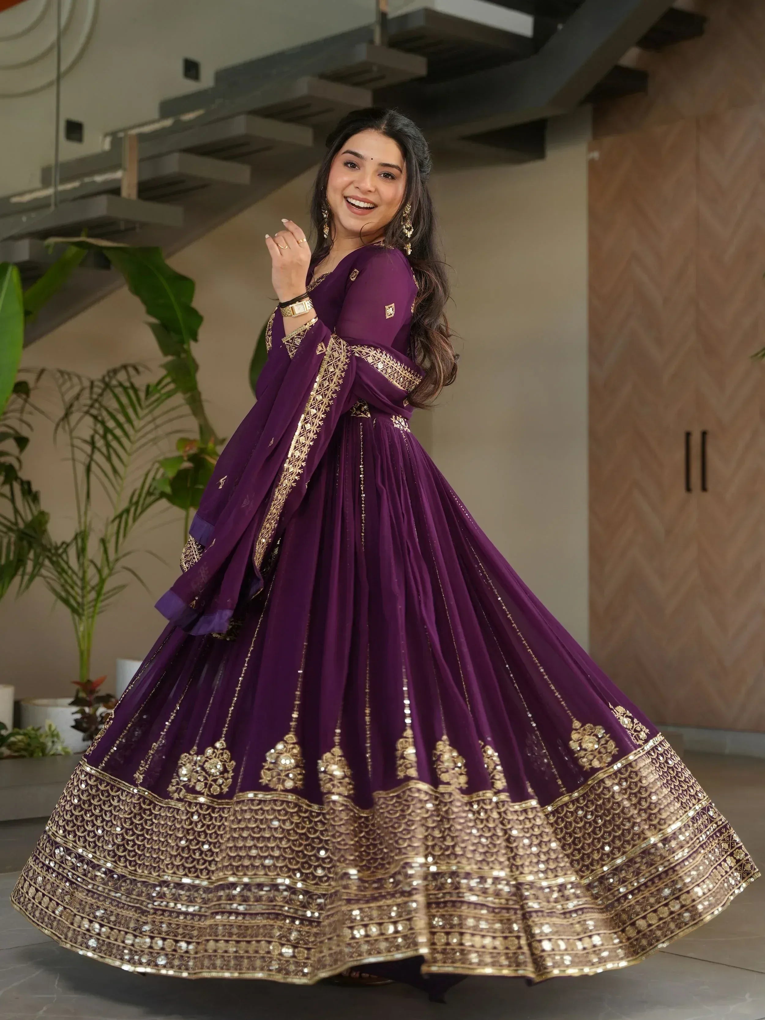 Elegant purple lehenga choli with gold embroidery and mirror work, perfect for Indian ethnic wear.