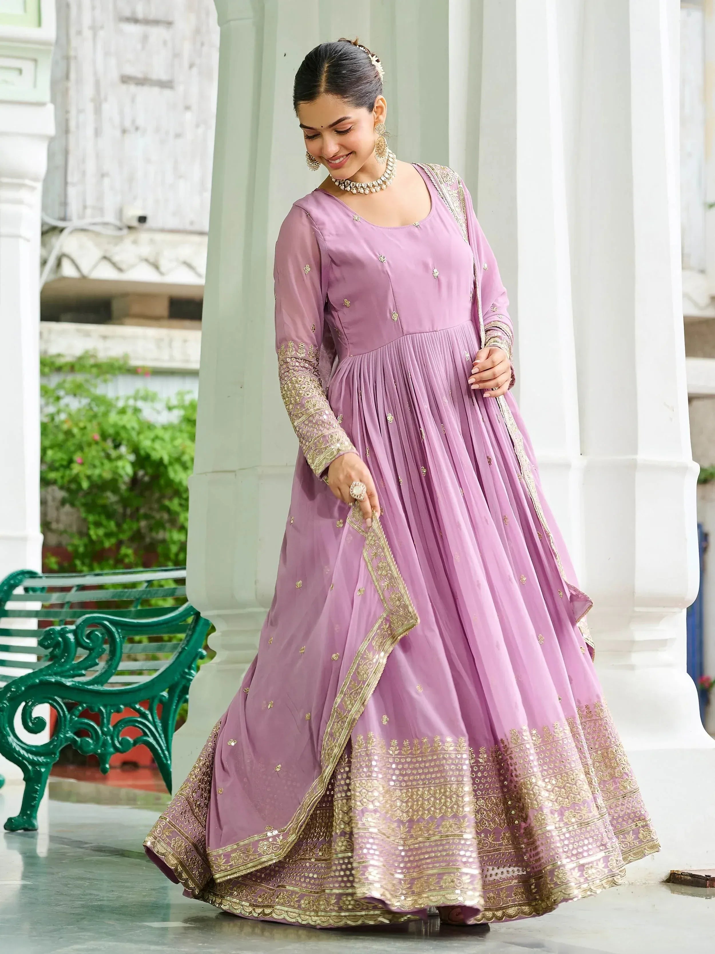 Lavender ethnic gown with gold embroidery, perfect for Indian occasions and festive wear
