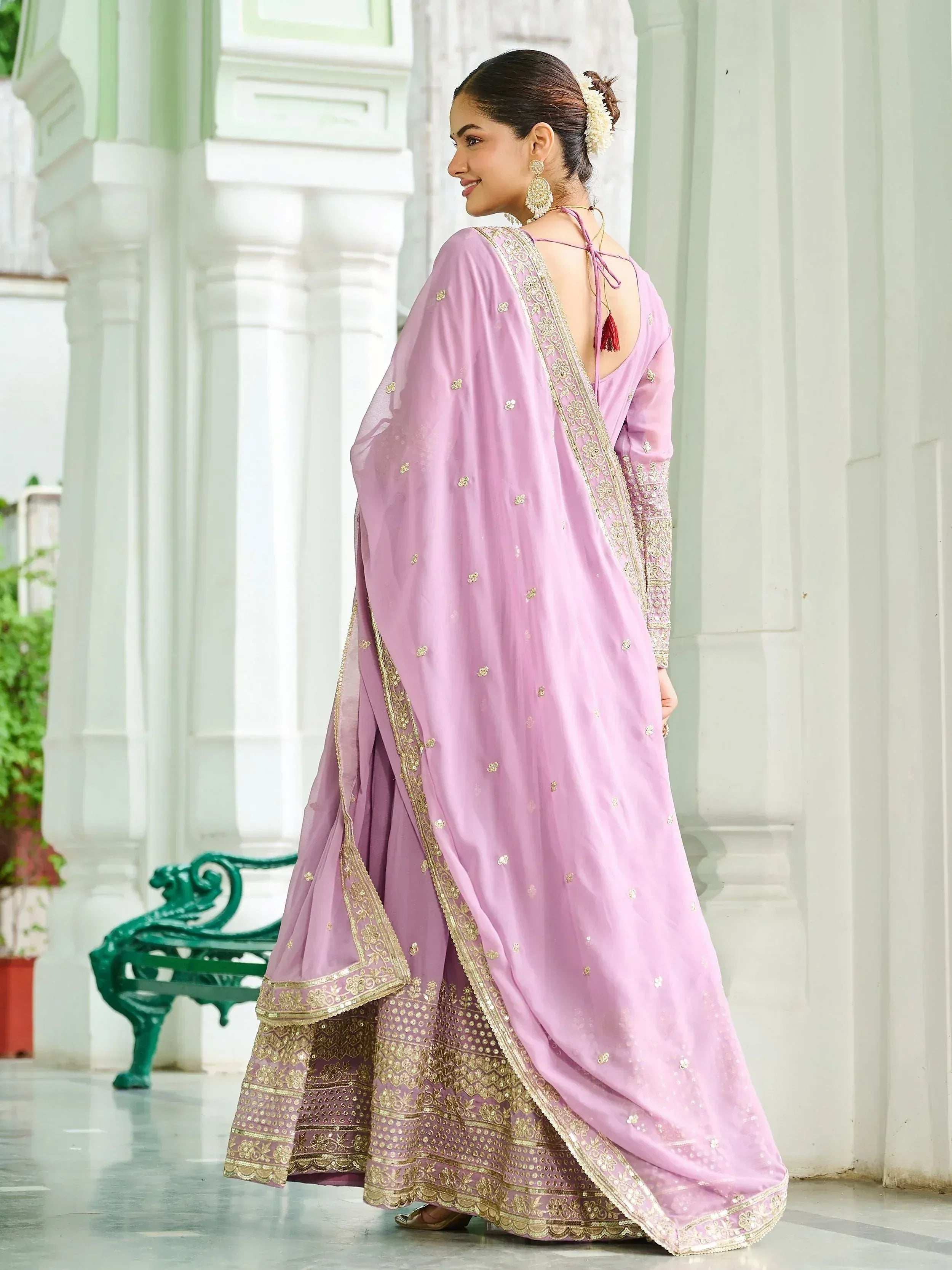 Lavender ethnic salwar kameez with gold embroidery and back tie detail, perfect for Indian occasions