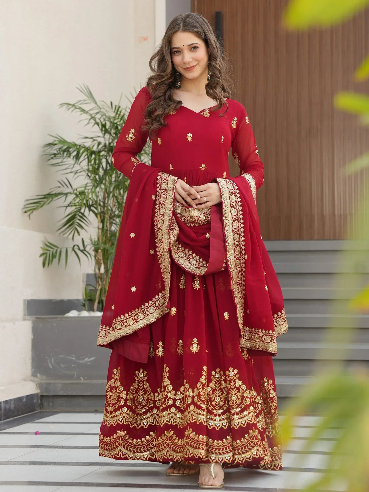 Red embroidered anarkali suit with gold detailing, perfect for Indian ethnic wear occasions