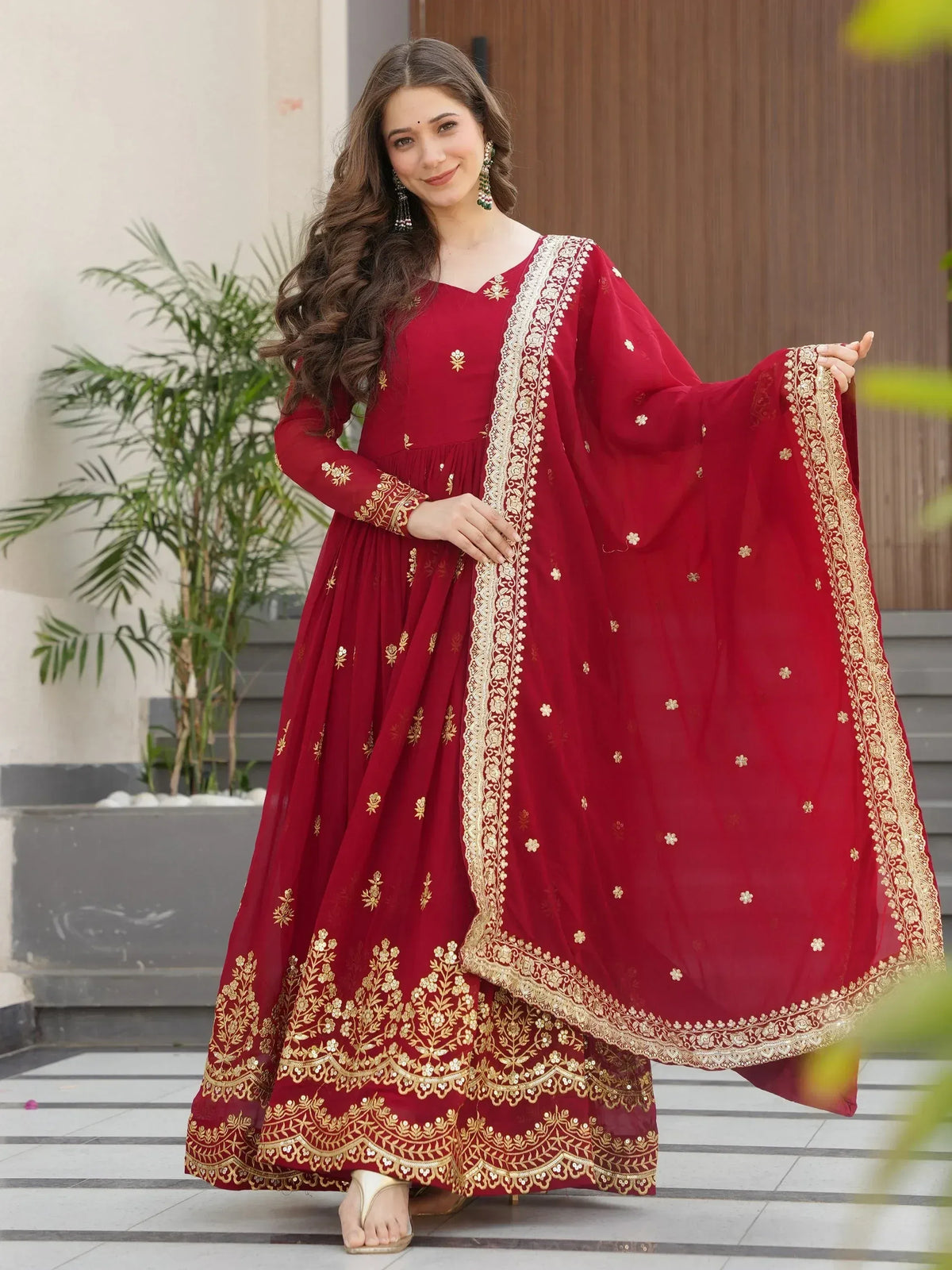 Red embroidered anarkali suit with gold detailing, perfect for Indian ethnic wear occasions