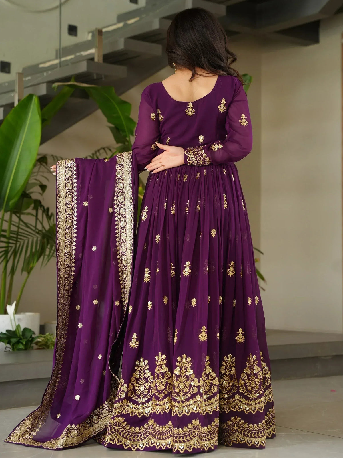 Purple ethnic anarkali with gold embroidery, perfect for Indian weddings and festive occasions