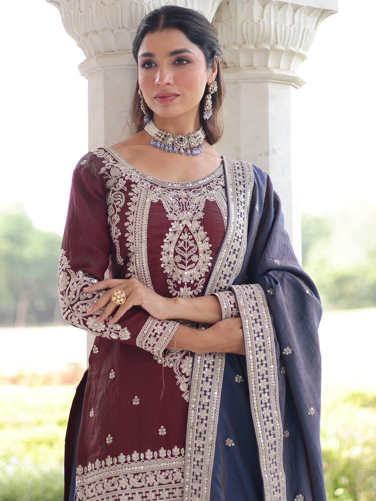 Maroon embroidered salwar kameez with blue dupatta, perfect for Indian ethnic wear occasions
