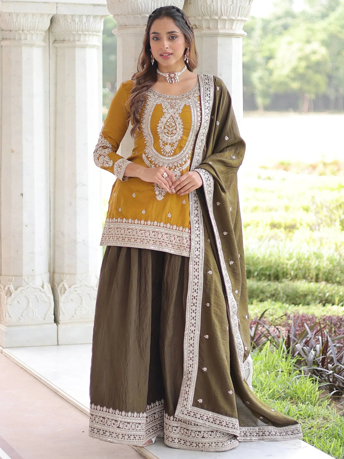 Mustard and olive green embroidered salwar kameez with detailed neckline and dupatta, perfect for ethnic occasions