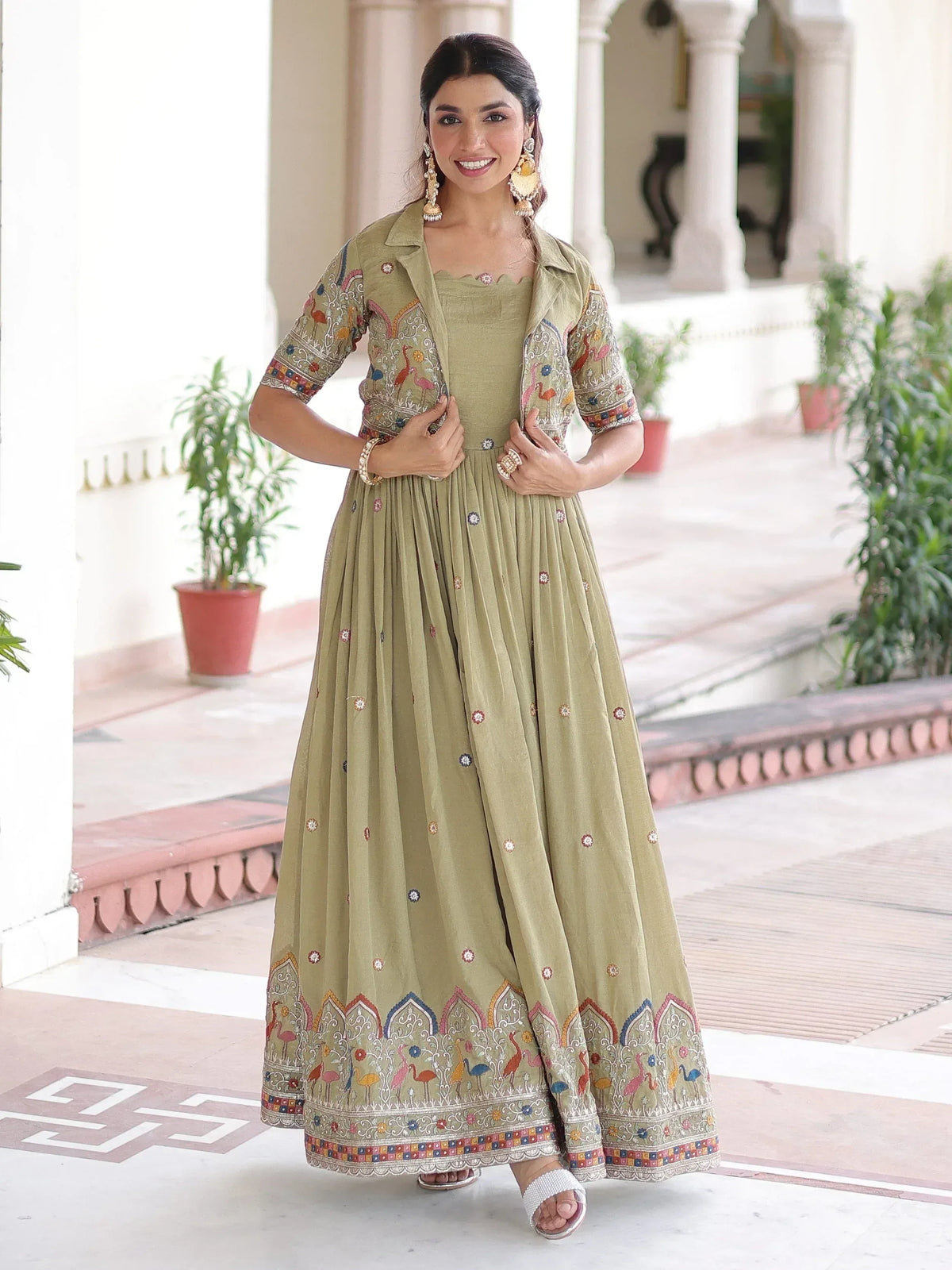 Elegant olive green ethnic gown with colorful bird embroidery and scalloped hem for festive occasions