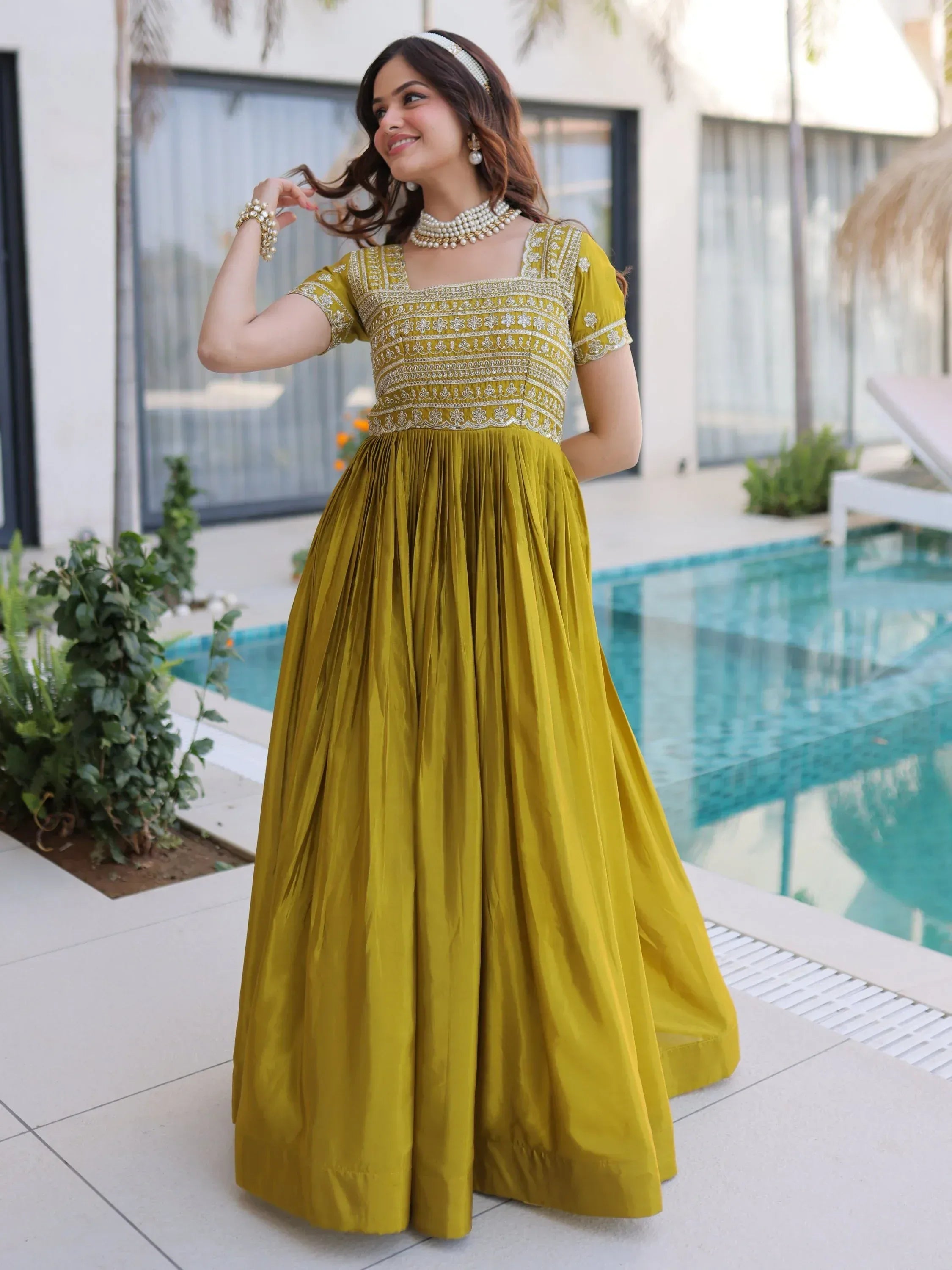 Astonishing Olive Green Zari Work Silk Mehendi Wear Gown