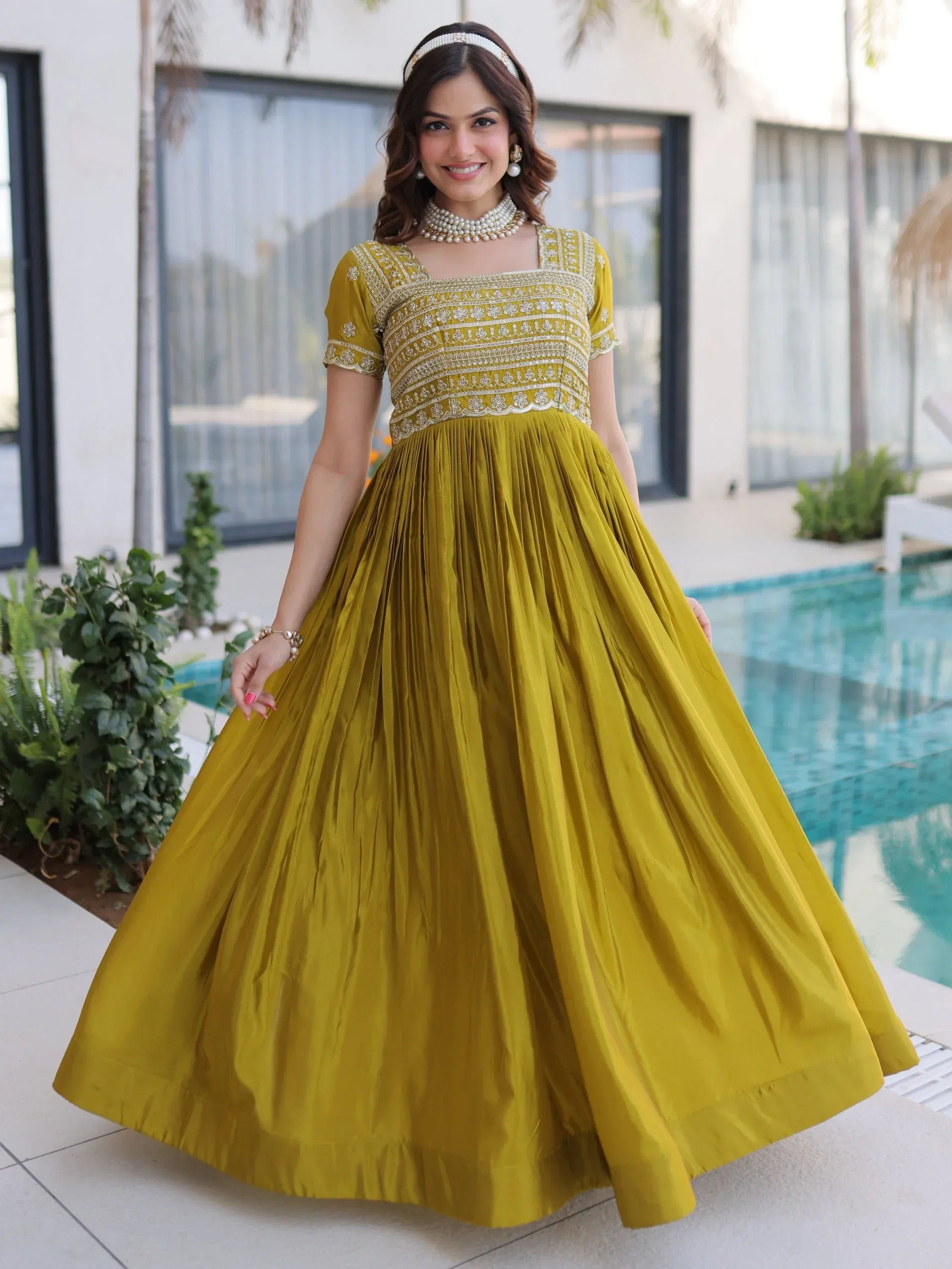 Astonishing Olive Green Zari Work Silk Mehendi Wear Gown