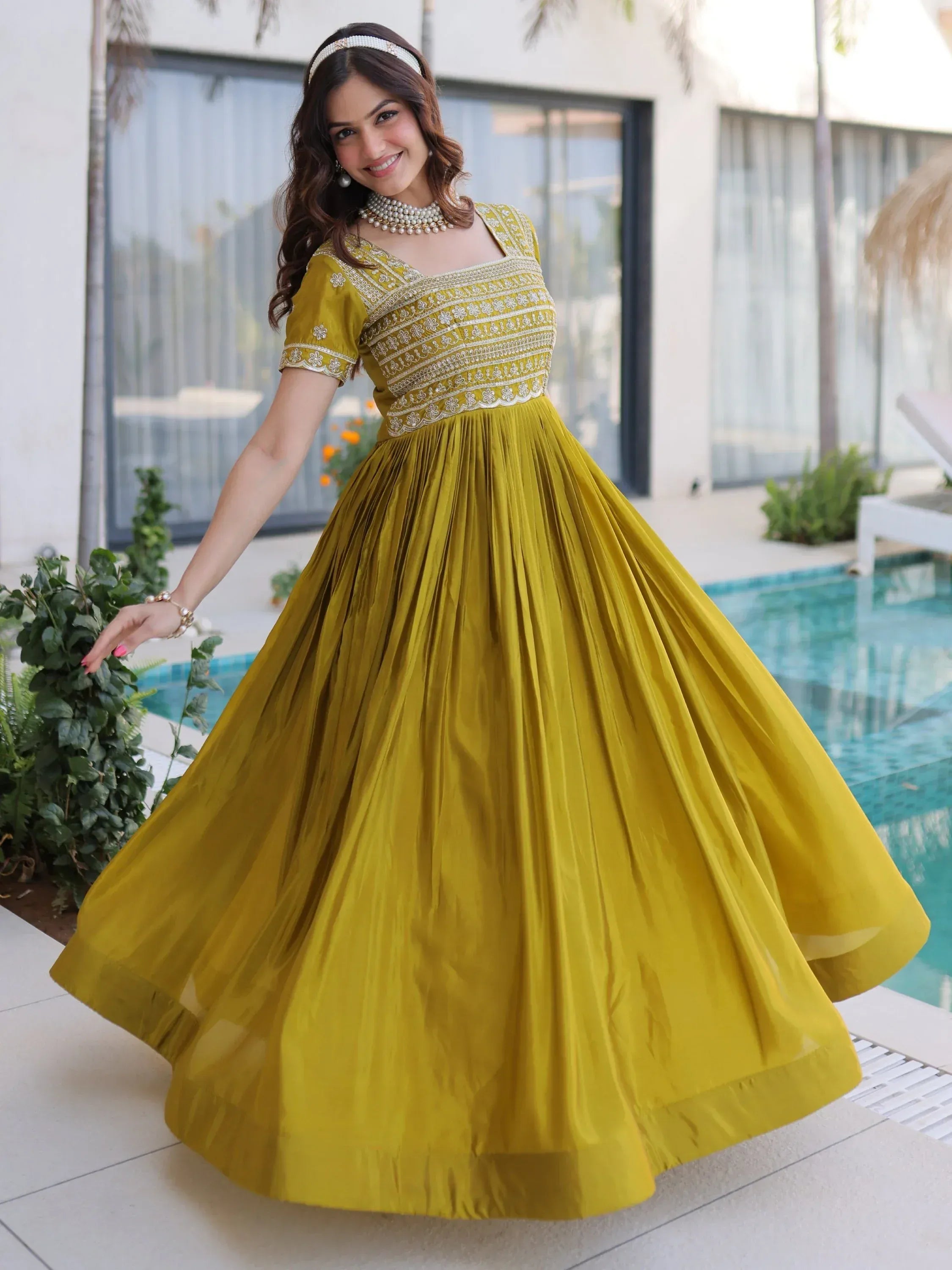 Astonishing Olive Green Zari Work Silk Mehendi Wear Gown
