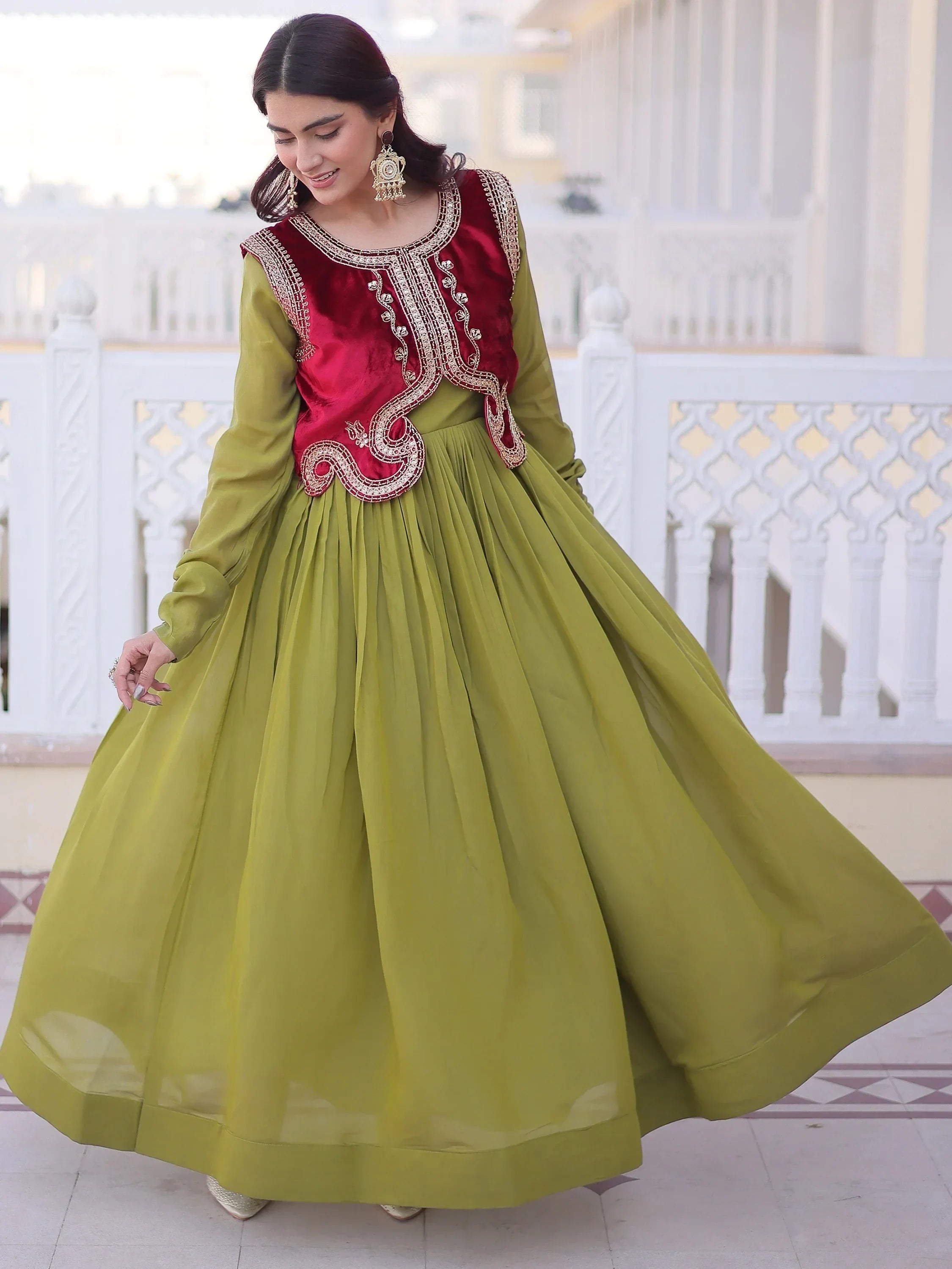 Beautiful Pista Green Function Wear Gown With Embroidered Koti