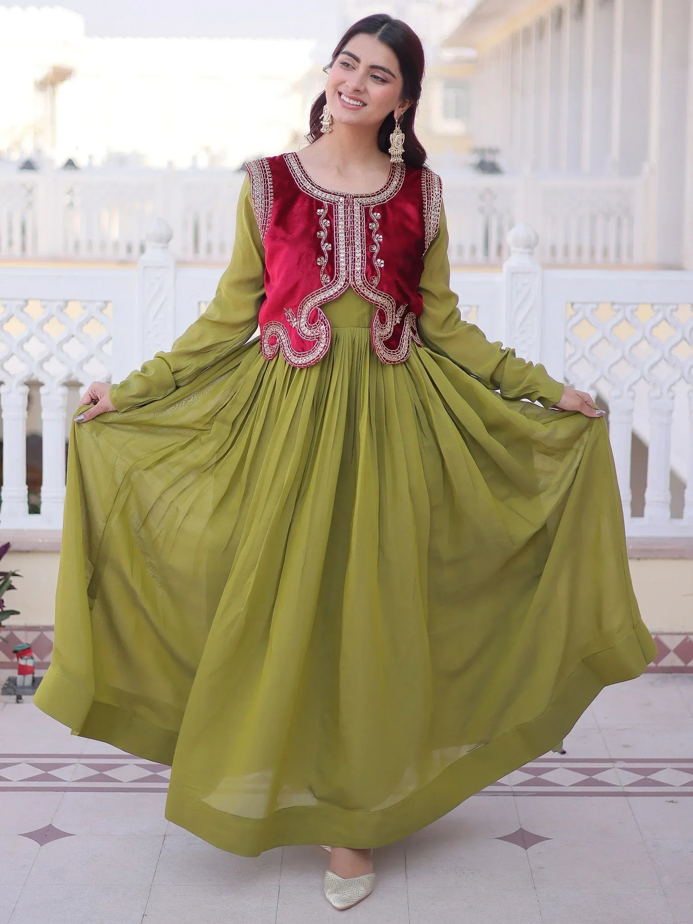 Beautiful Pista Green Function Wear Gown With Embroidered Koti