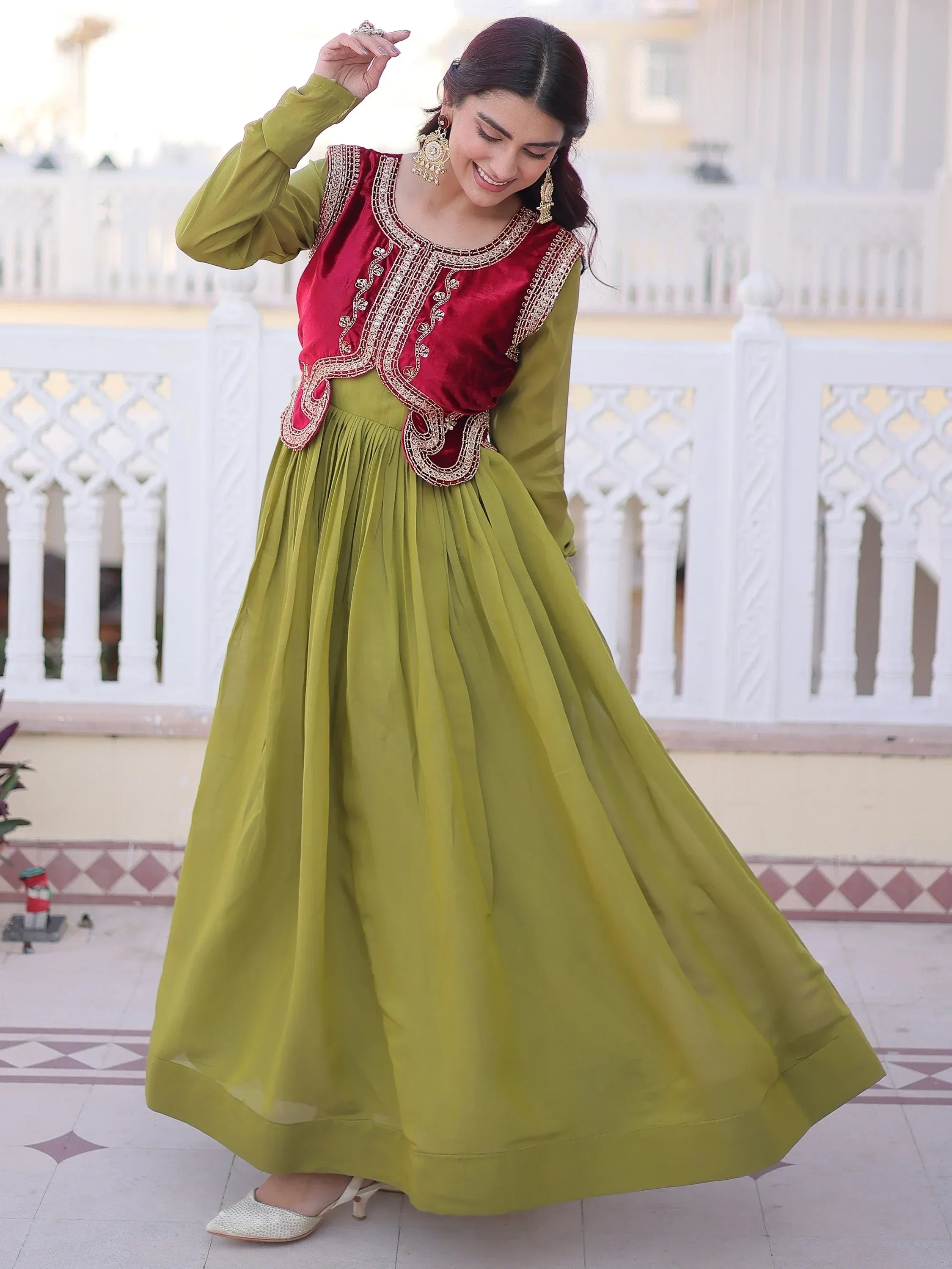 Beautiful Pista Green Function Wear Gown With Embroidered Koti
