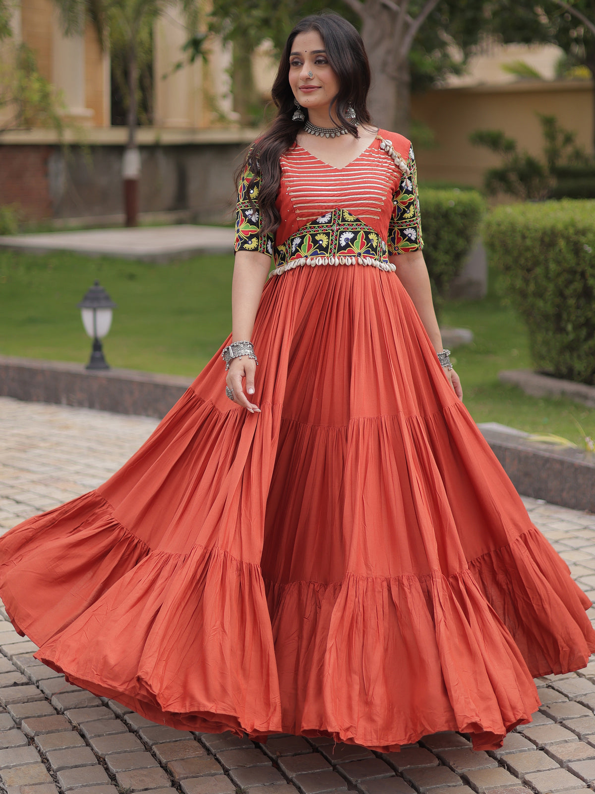 Astonishing Rust Orange Kutchi Work Rayon Navratri Wear Gown