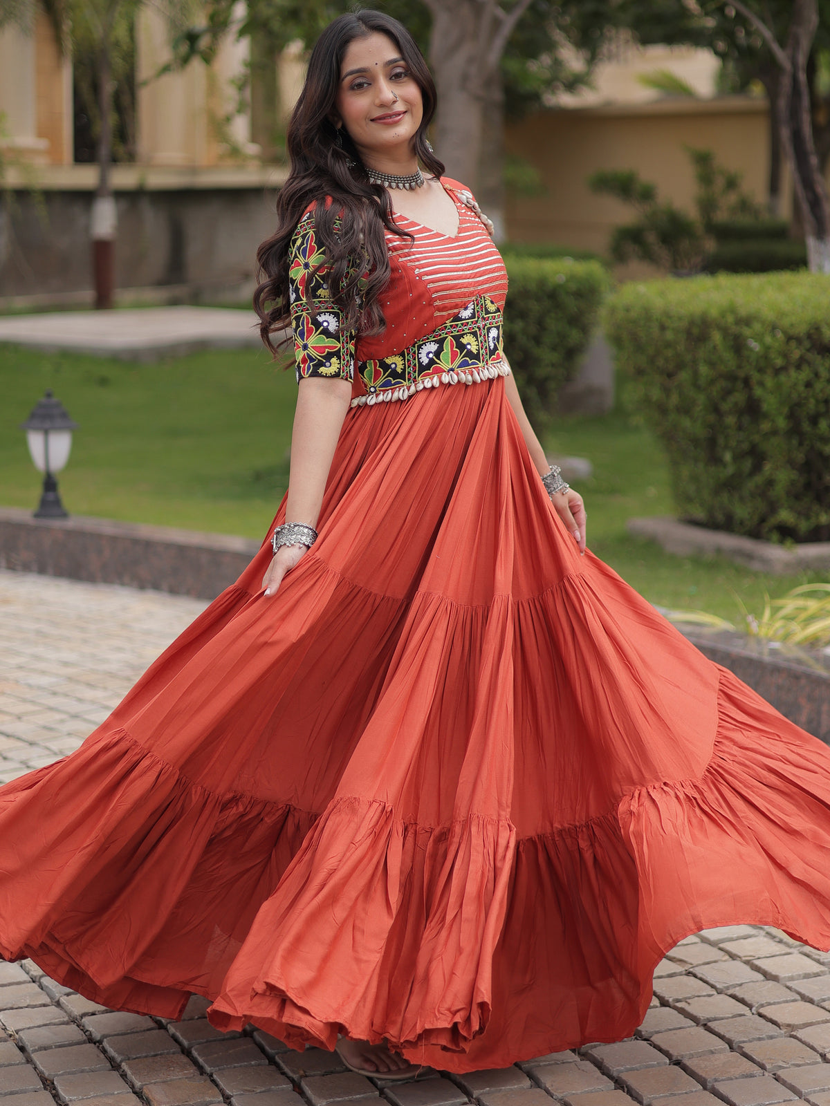 Astonishing Rust Orange Kutchi Work Rayon Navratri Wear Gown