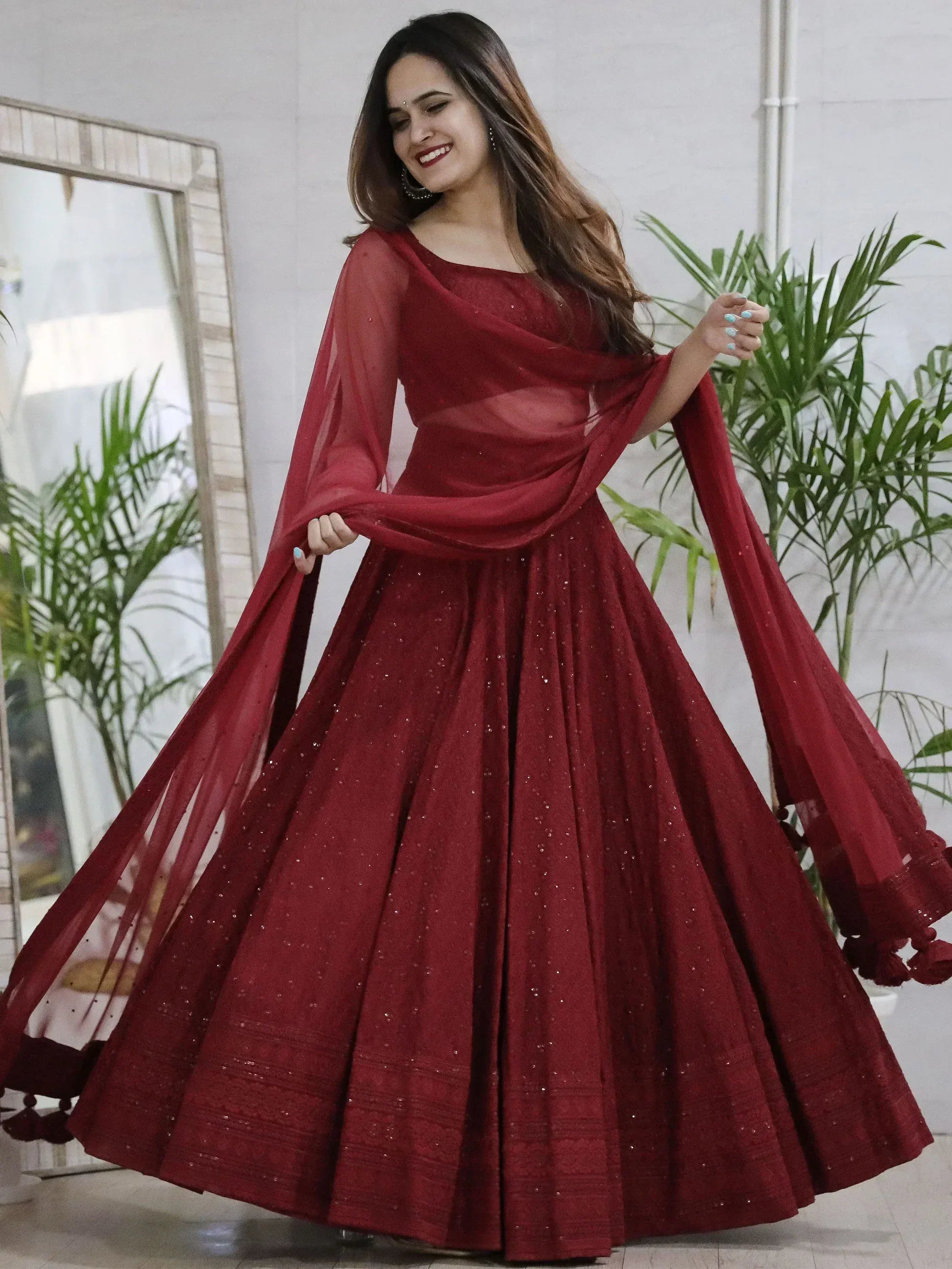 Elegant maroon lehenga choli with sequins and sheer dupatta for Indian ethnic wear