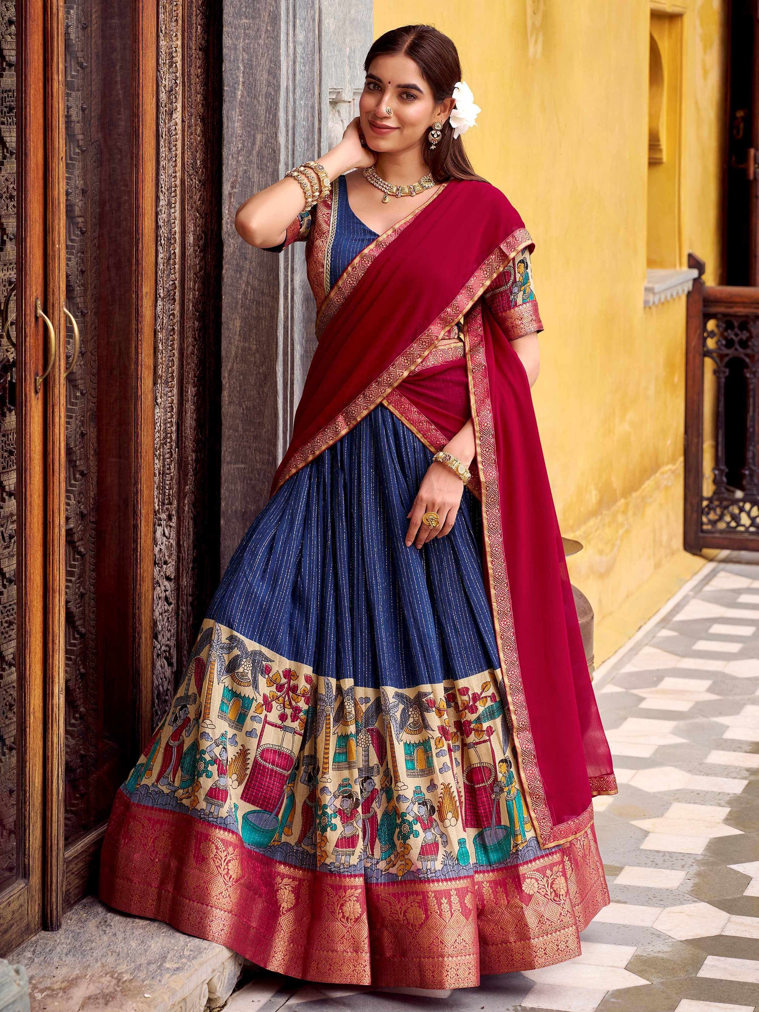Blue and maroon printed lehenga choli with traditional Indian motifs, perfect for ethnic occasions.