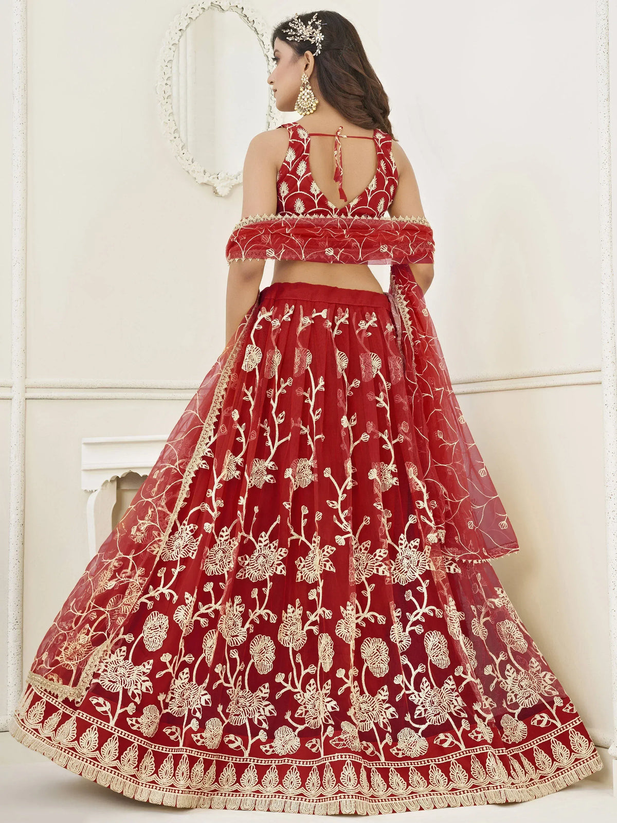 Red floral embroidered lehenga choli with off-shoulder dupatta, perfect for Indian weddings and festive occasions