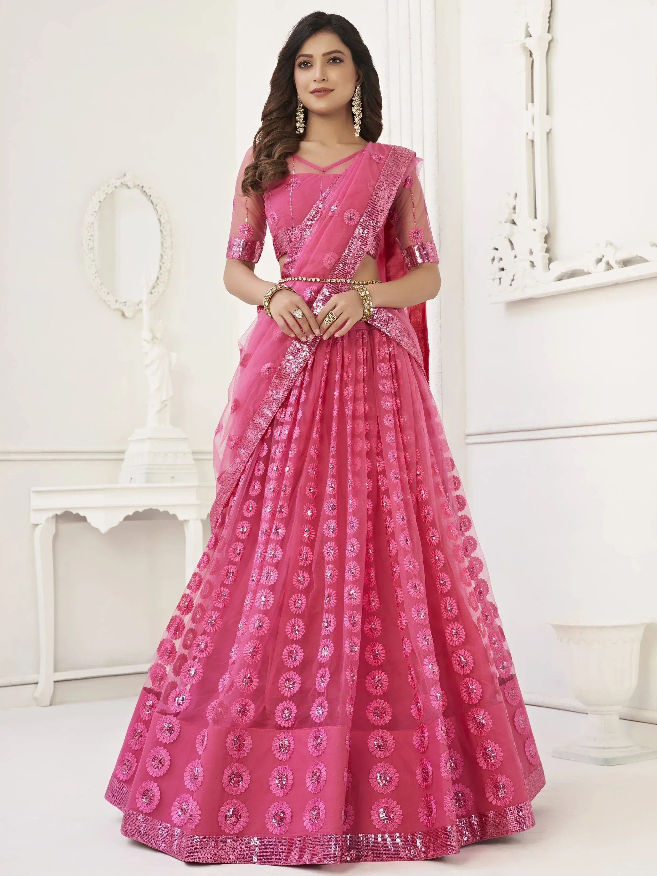 Pink designer lehenga choli with floral embroidery and sequins, perfect for Indian ethnic wear occasions