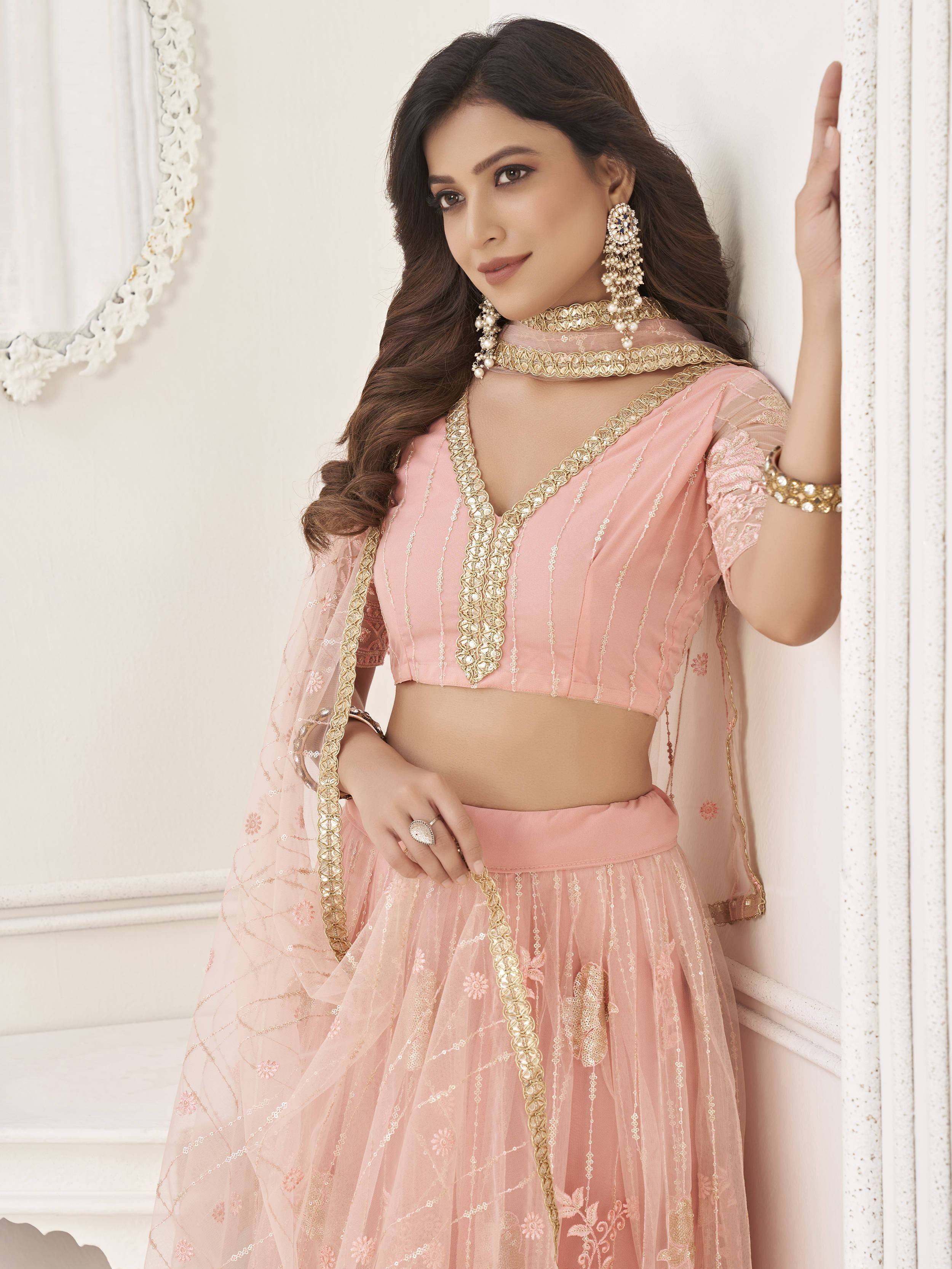 Fascinating Peach Sequin Net Bridesmaid Lehenga Choli With Dupatta