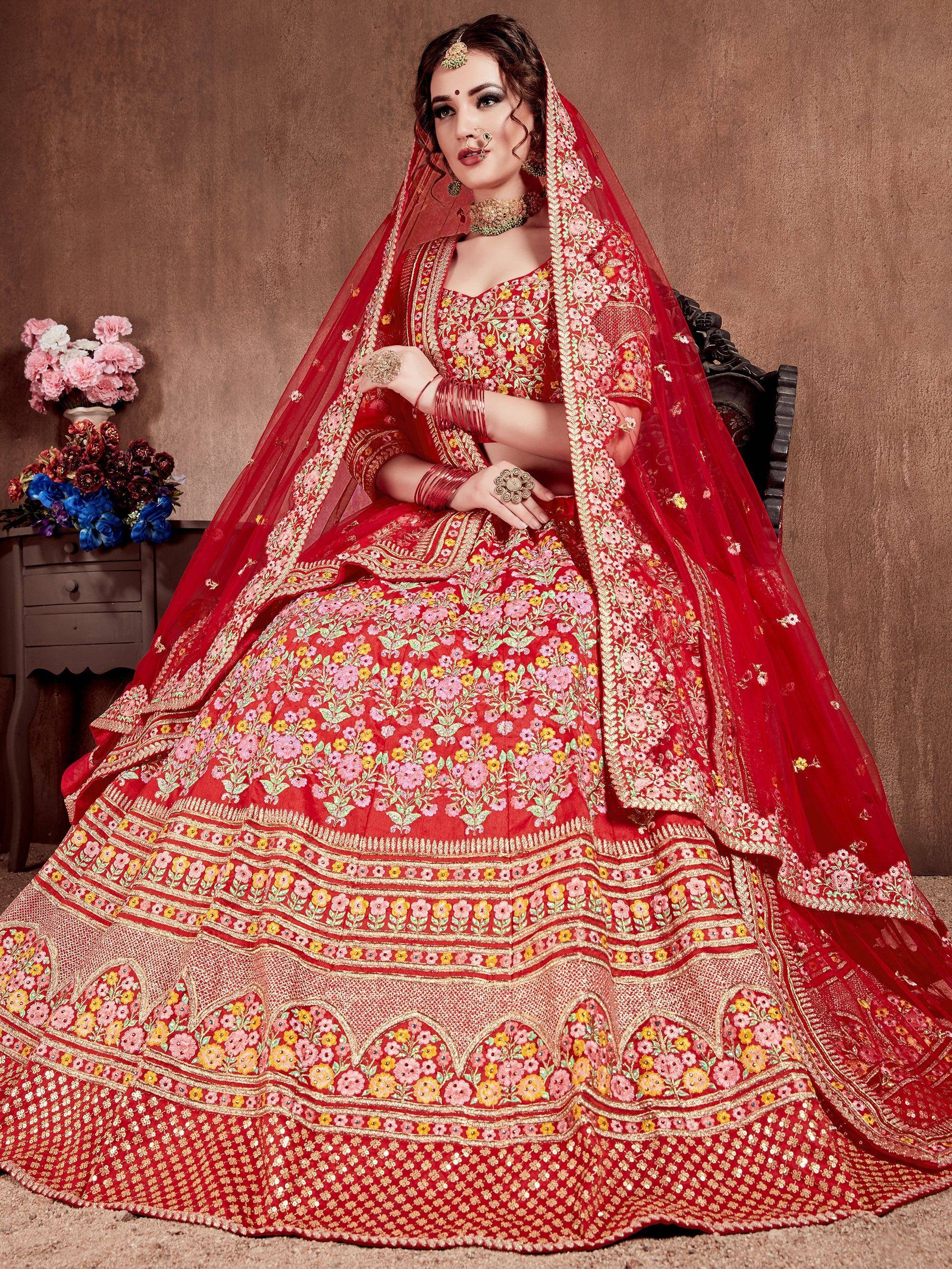 Red floral embroidered lehenga choli with matching dupatta, perfect for Indian weddings and ethnic events.
