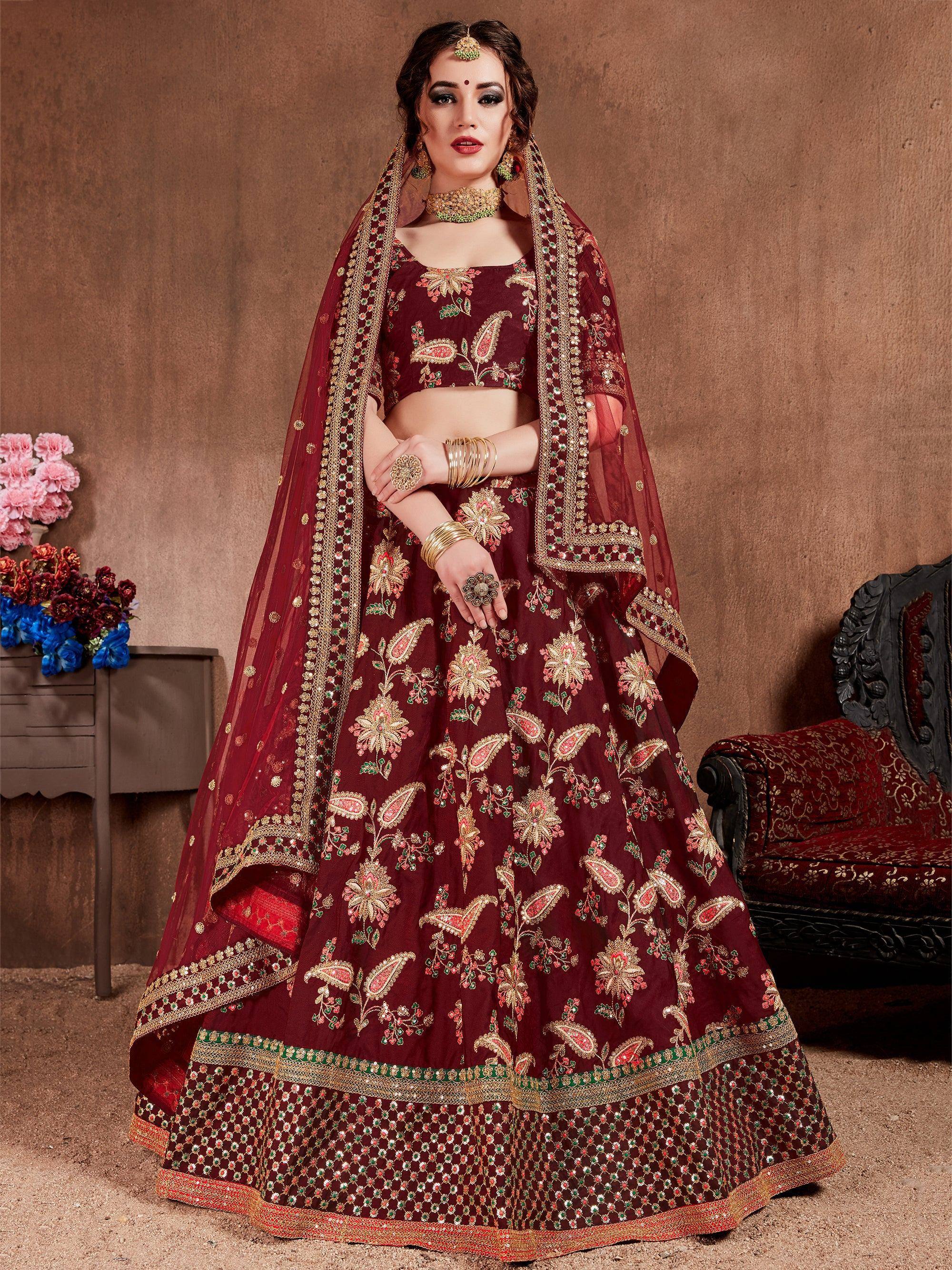 Maroon designer lehenga choli with gold floral embroidery and matching dupatta for Indian weddings